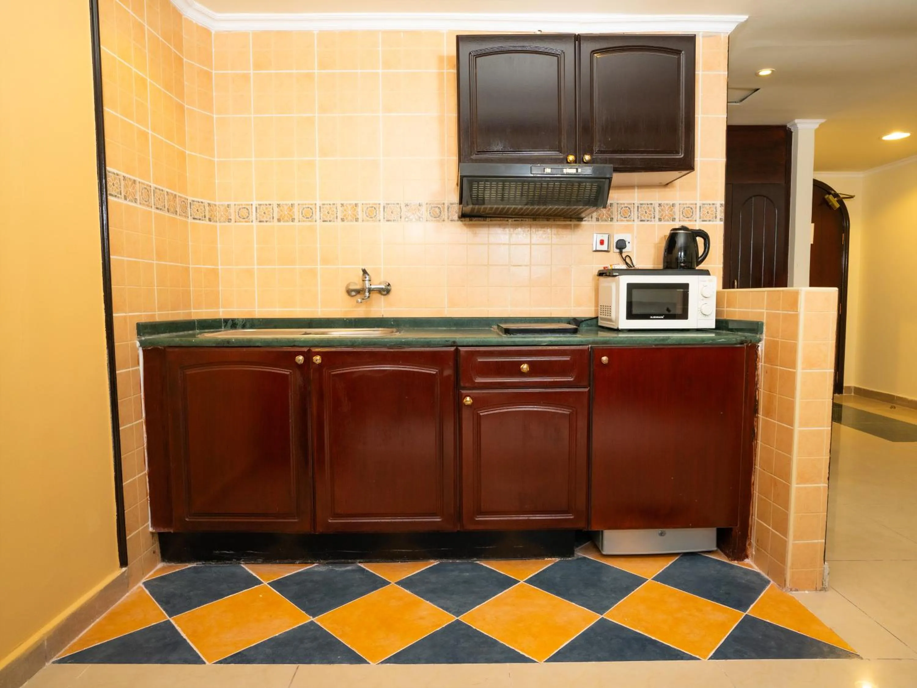 kitchen in Oriental Hotel Apartments