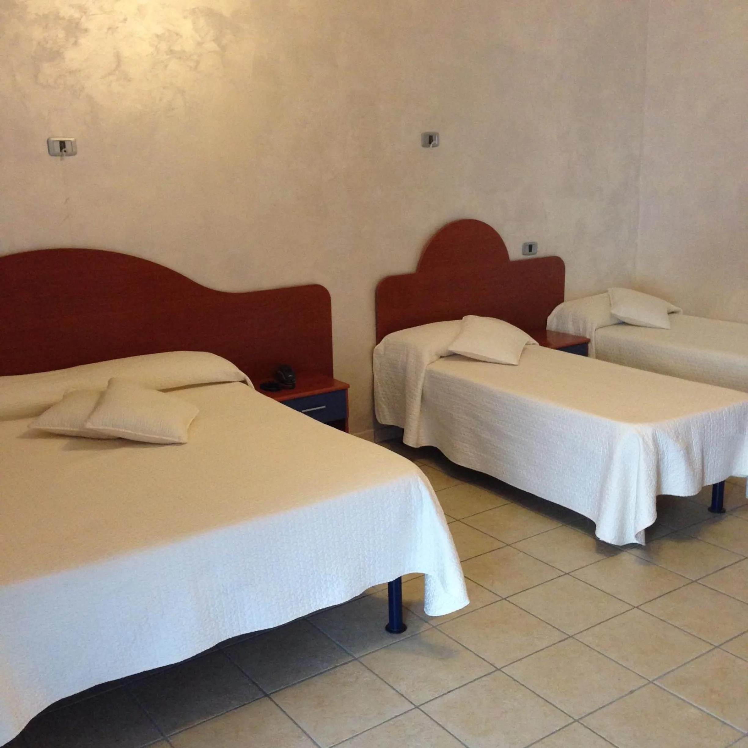 Bed in Tea Palace Hotel