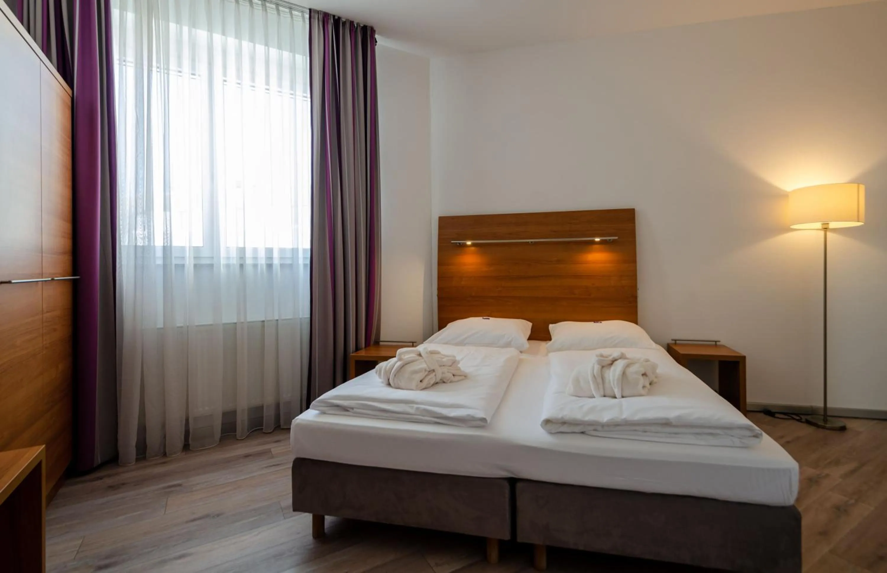 Photo of the whole room, Bed in Hotel Fortuna Reutlingen-Tübingen