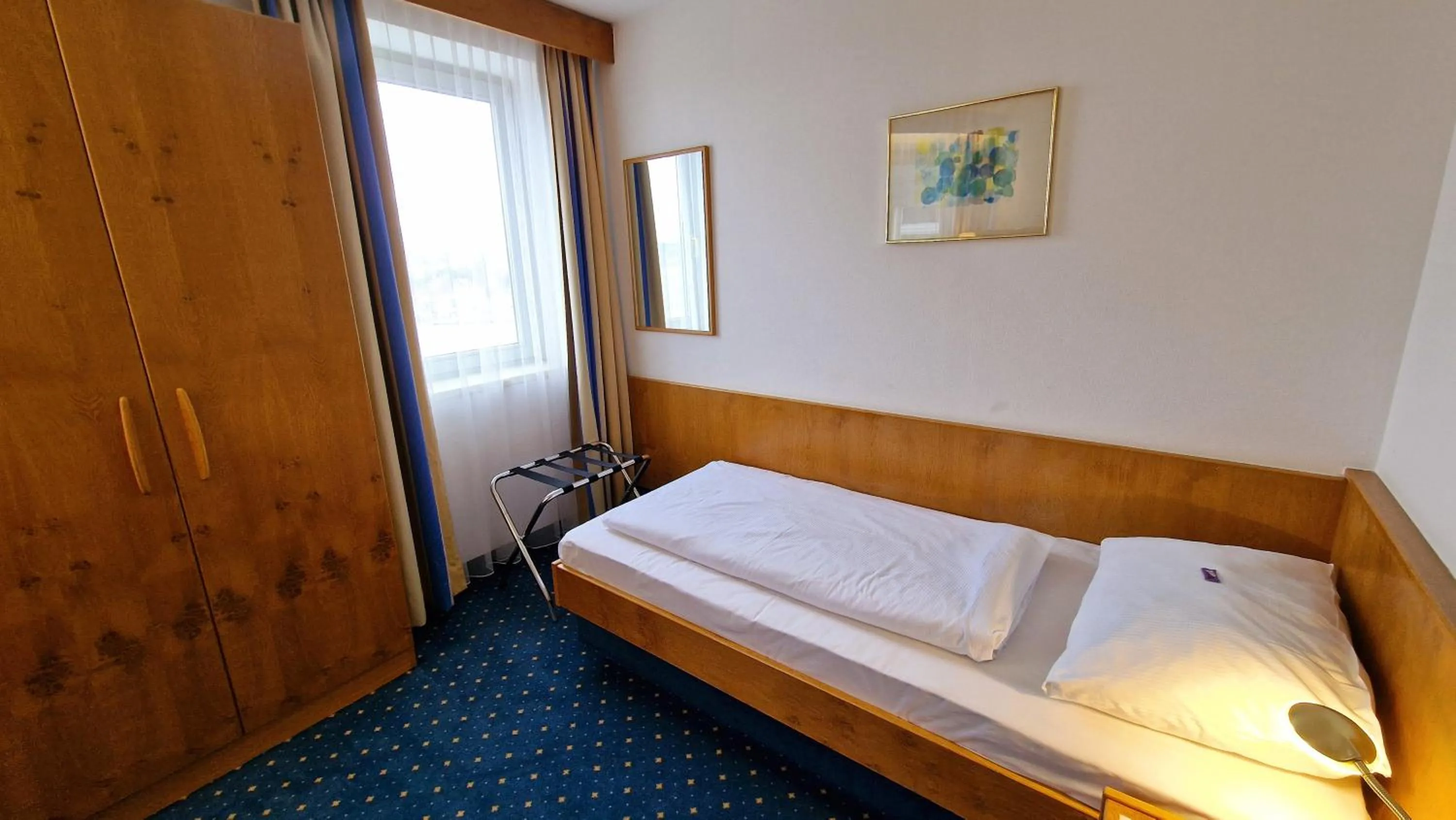 Photo of the whole room, Bed in Hotel Fortuna Reutlingen-Tübingen
