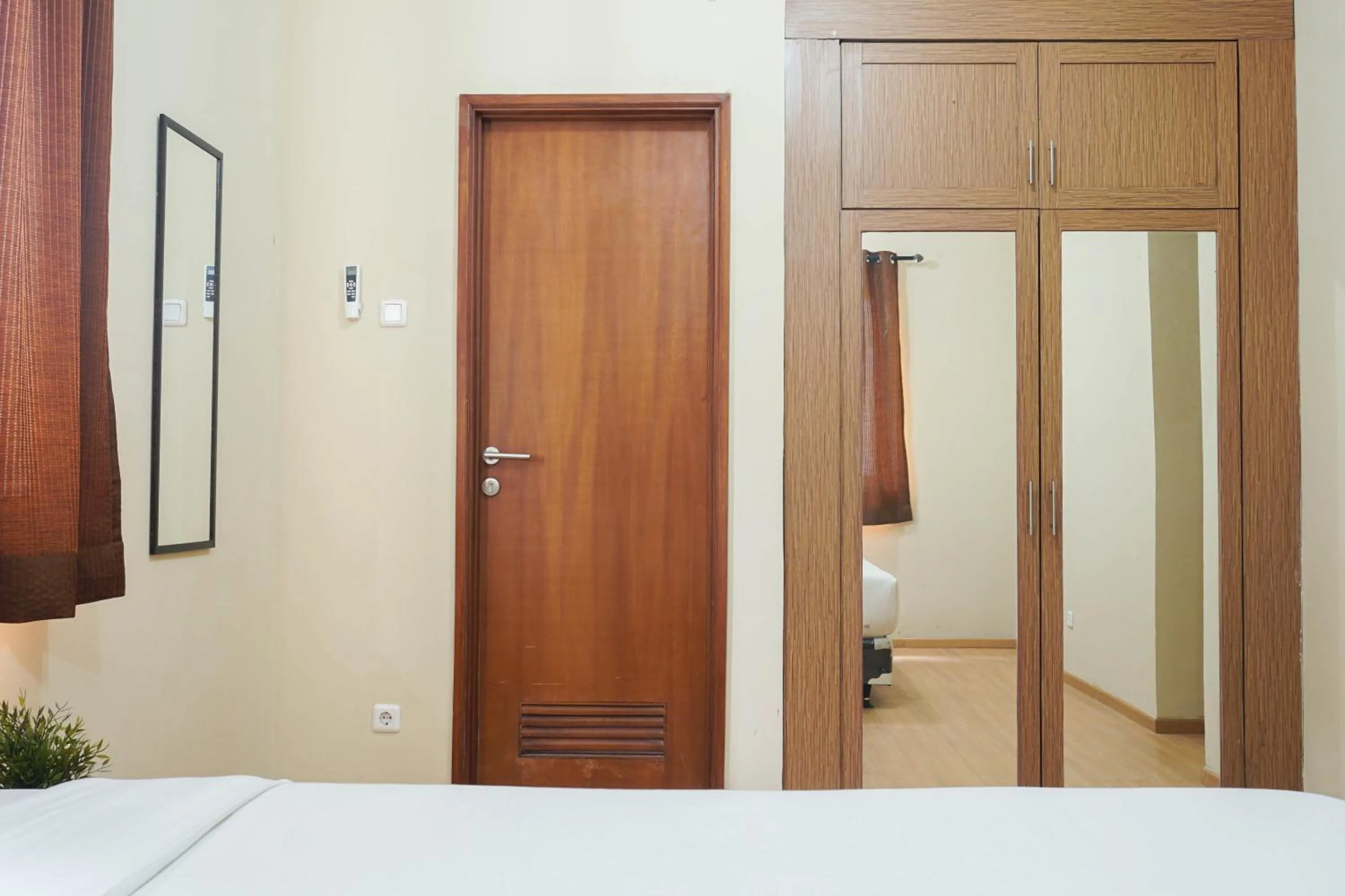 Bed in Spacious 3BR Residence at Grand Palace Kemayoran Apartment By Travelio