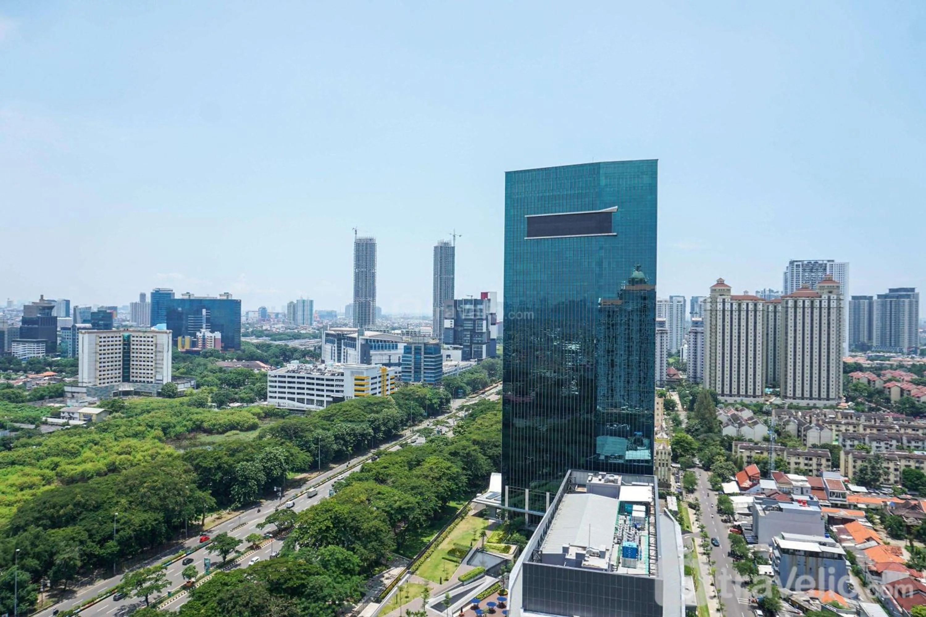 Property building in Spacious 3BR Residence at Grand Palace Kemayoran Apartment By Travelio