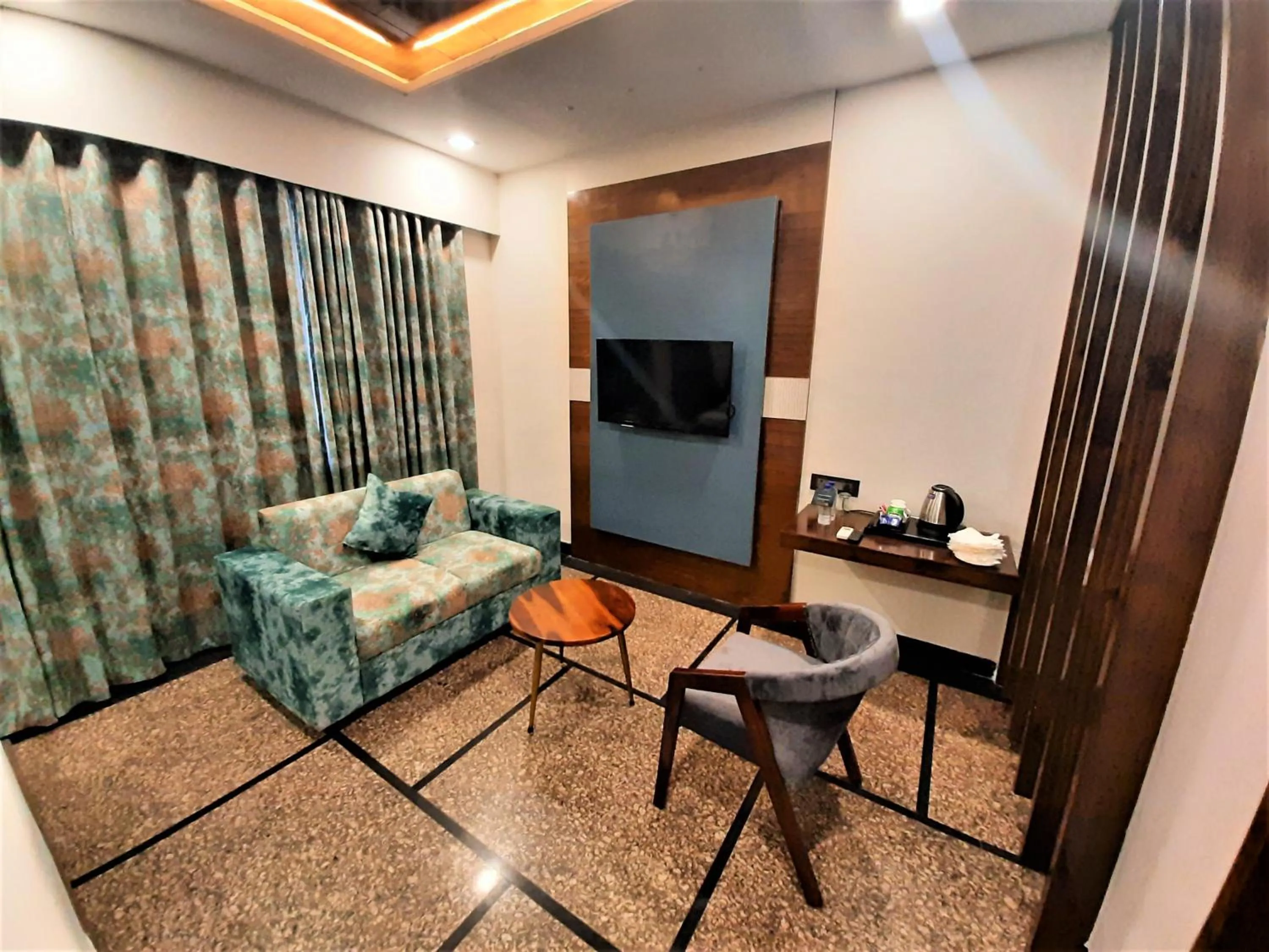 TV and multimedia in Suvin Residency with Rooftop Swimming Pool