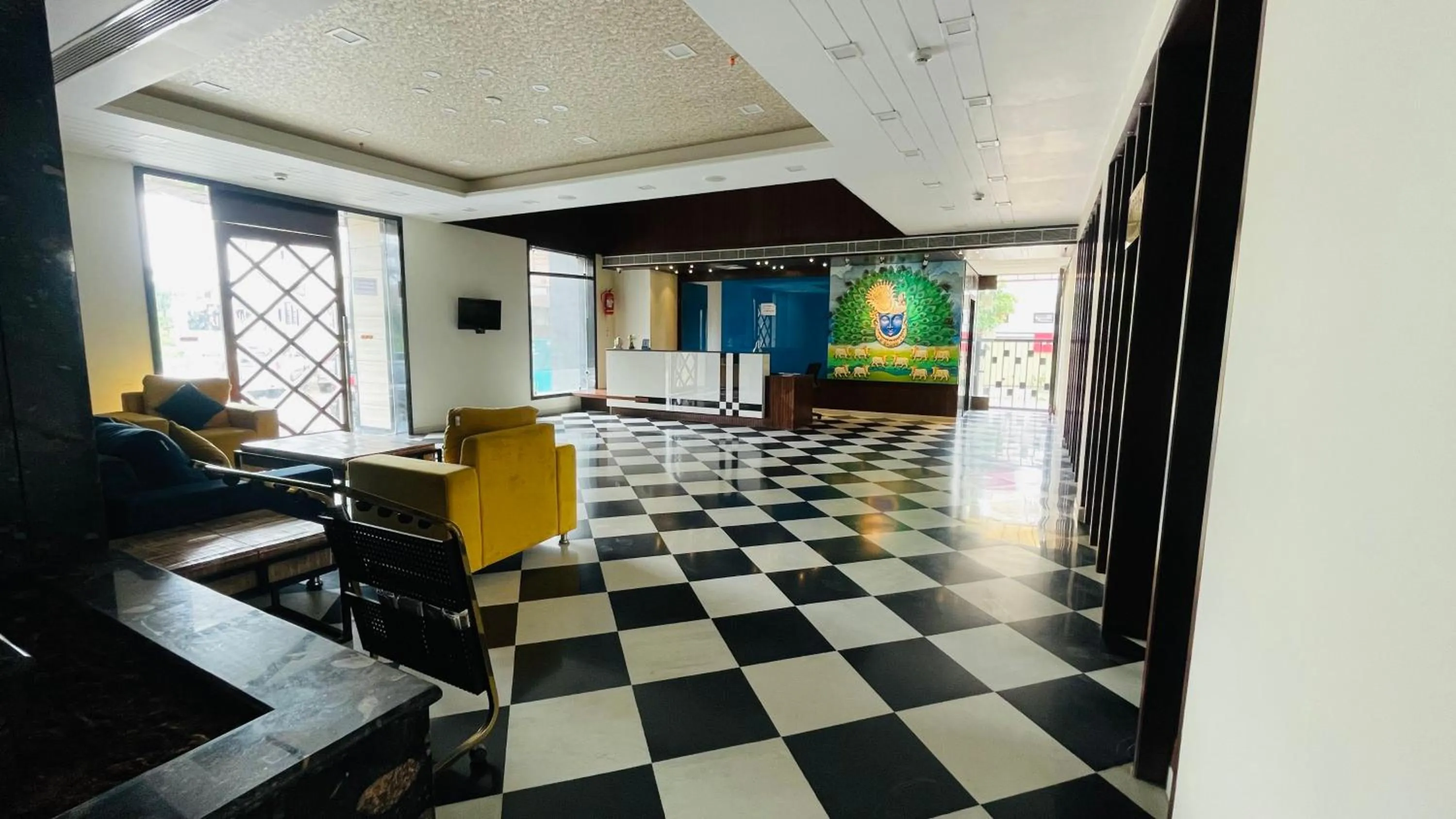 Lobby or reception in Suvin Residency with Rooftop Swimming Pool