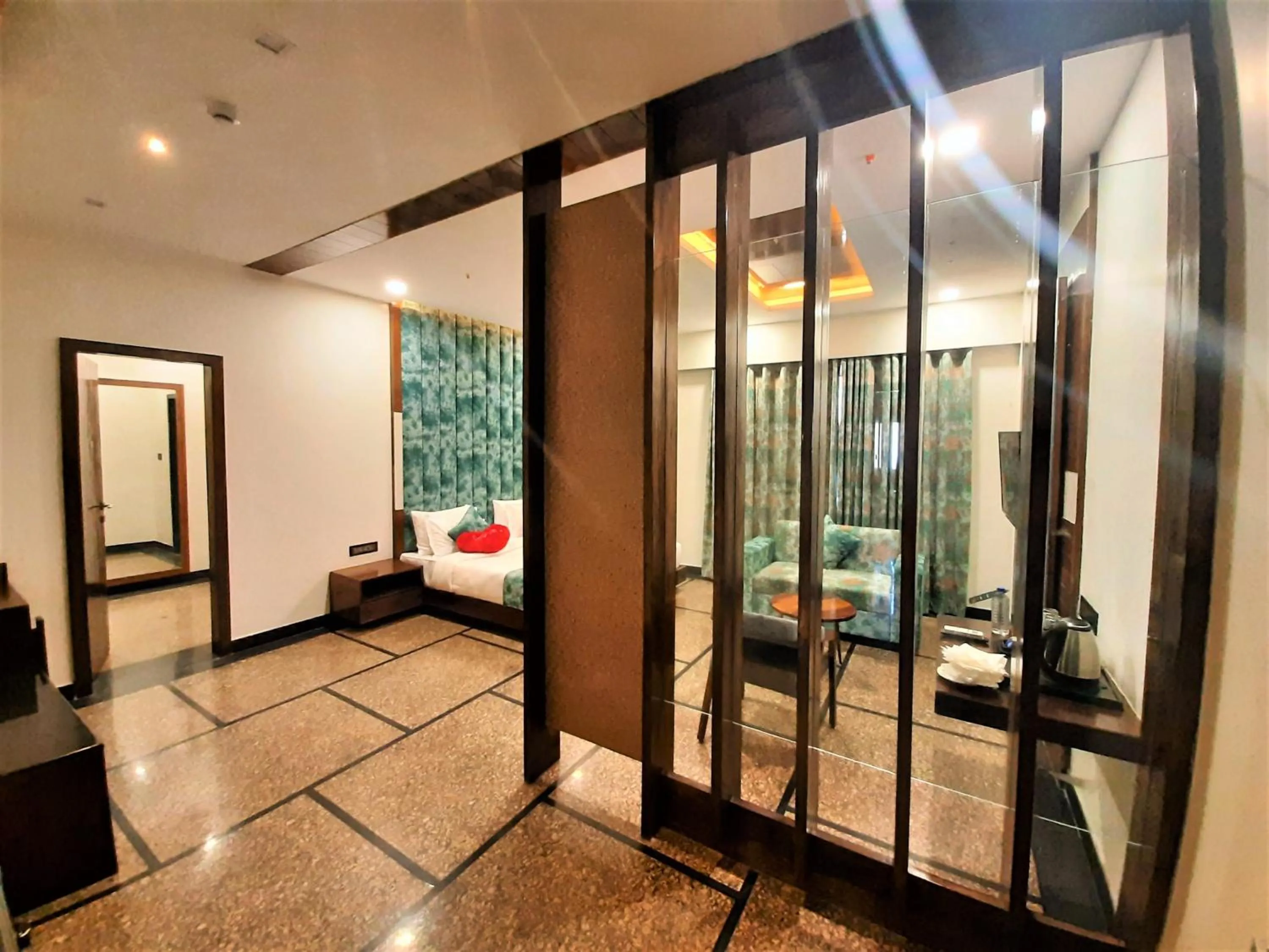 Bed in Suvin Residency with Rooftop Swimming Pool