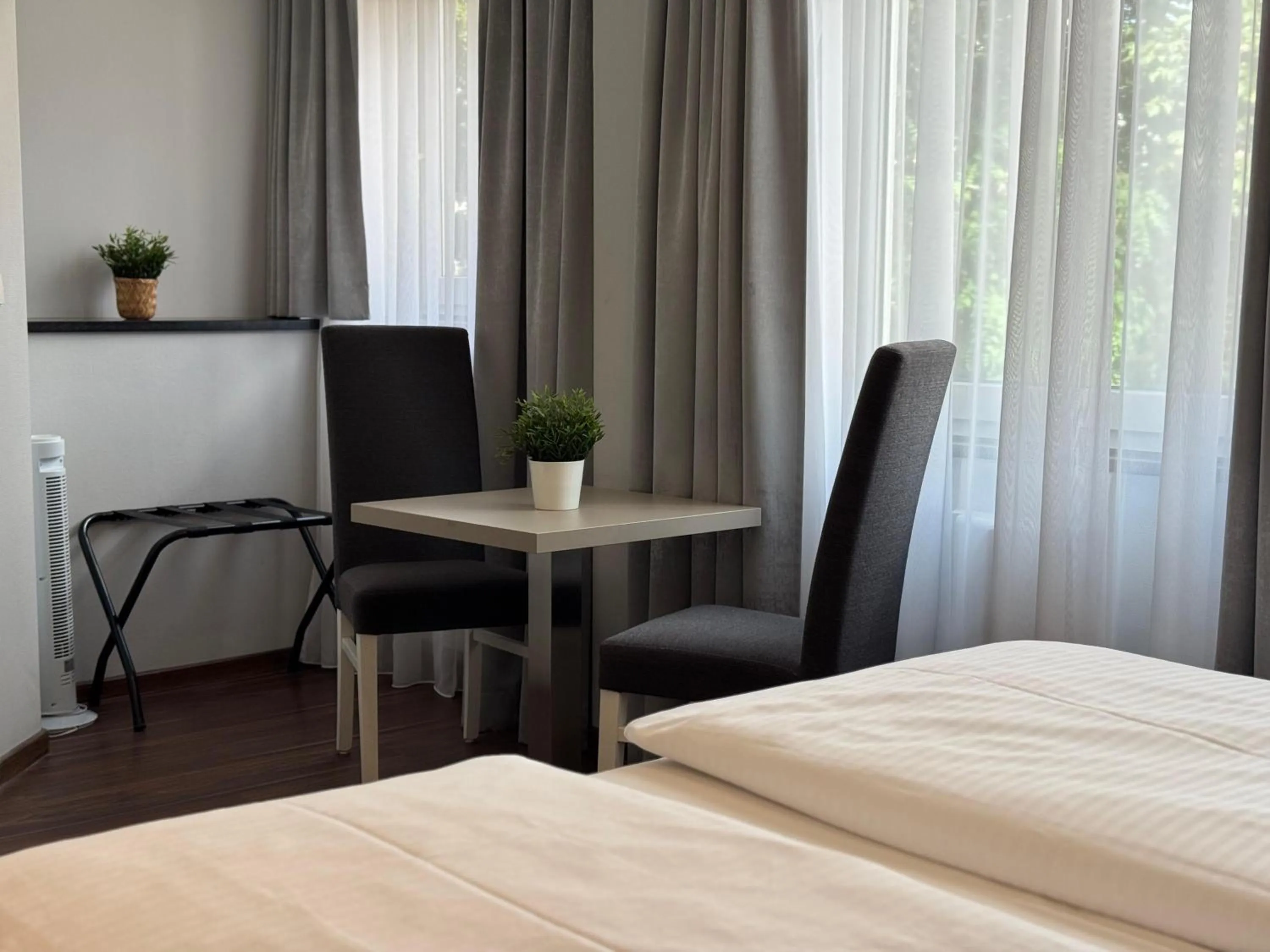 Bed in Mirage City Hotel Stuttgart Zentrum