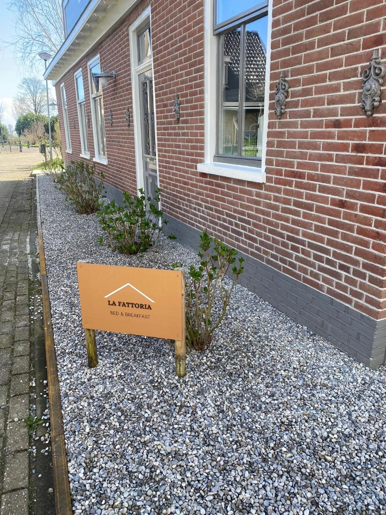 Property logo or sign in La Fattoria Bed&breakfast