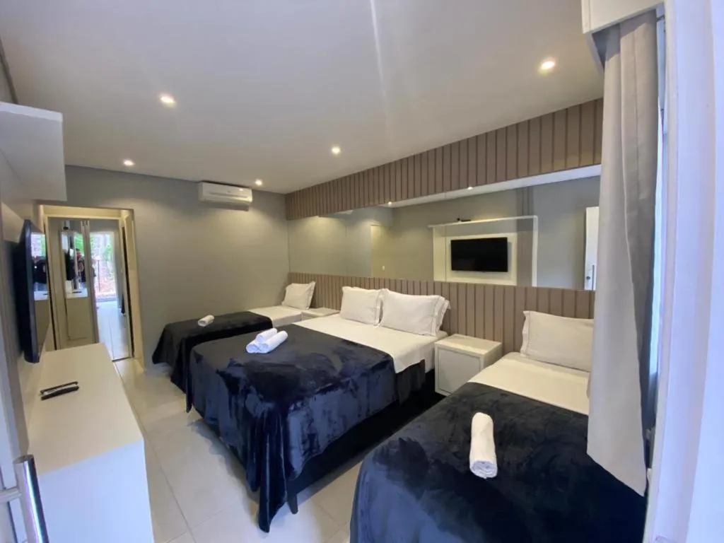 Bed in POUSADA HAPPY DAY PARATY