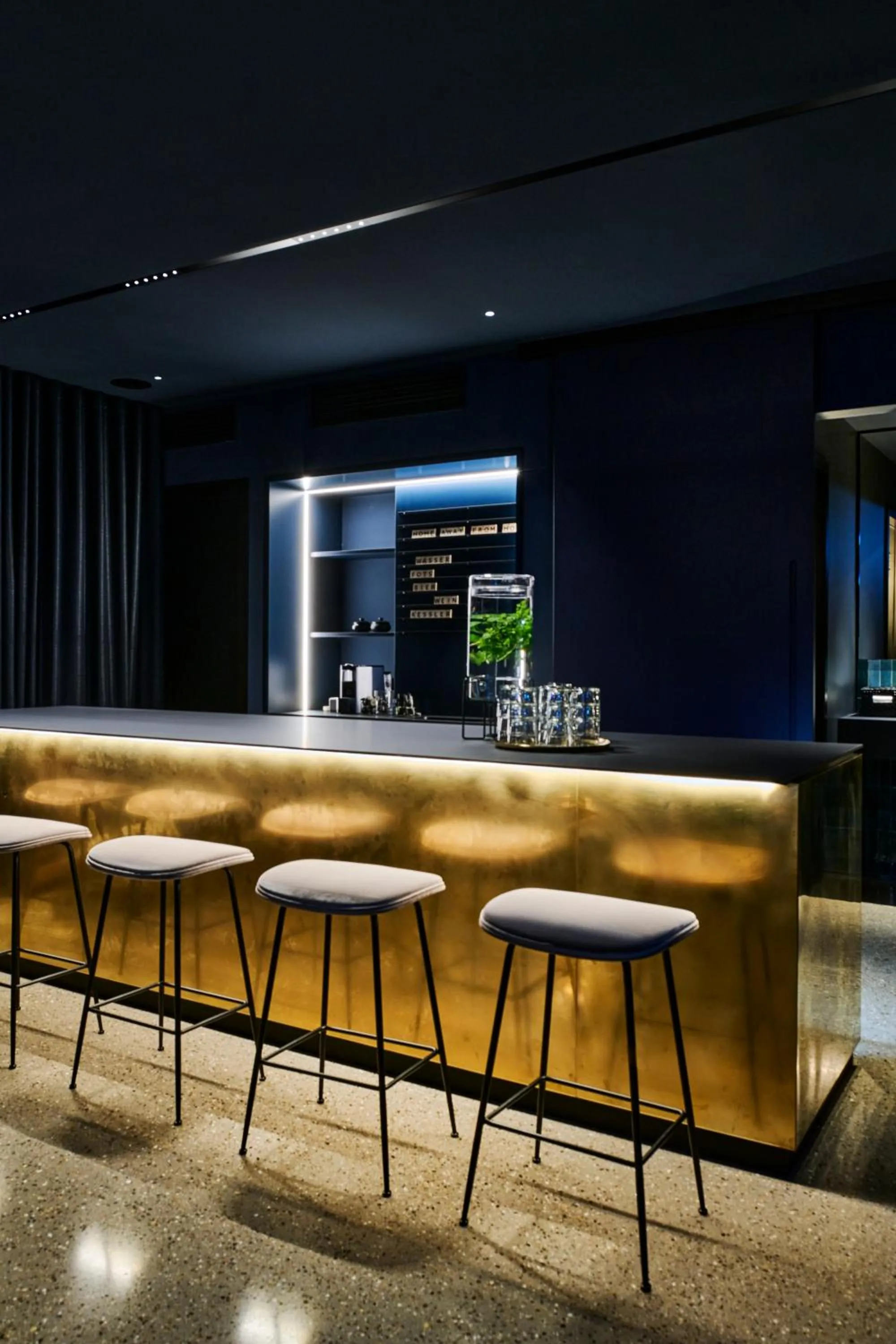 Communal lounge/ TV room in EmiLu Design Hotel