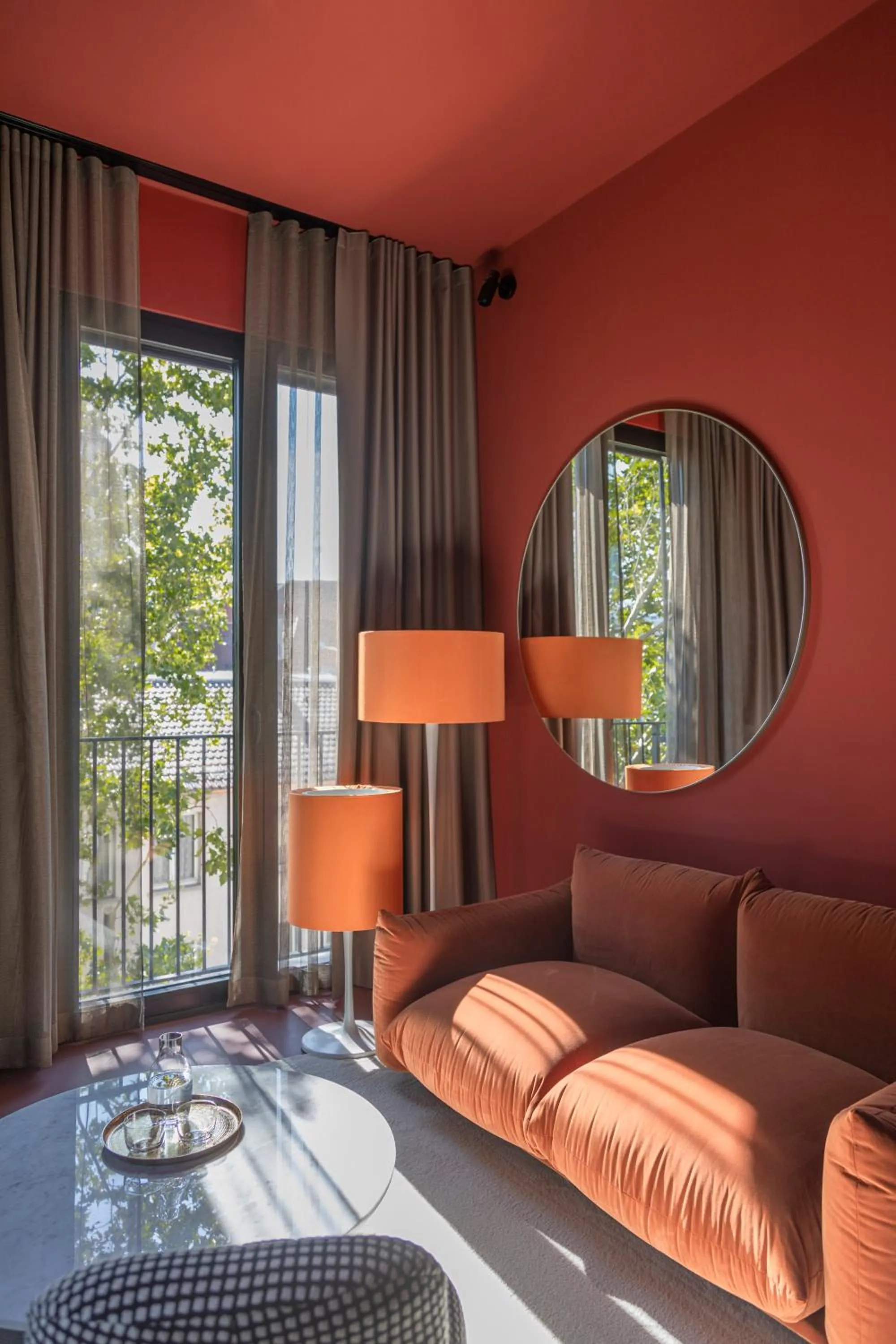 Seating area, Bed in EmiLu Design Hotel