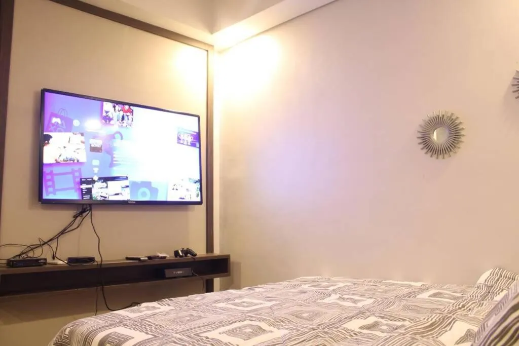 Bed in A2J Luxury BGC Balcony Suite Near SM AURA Taguig