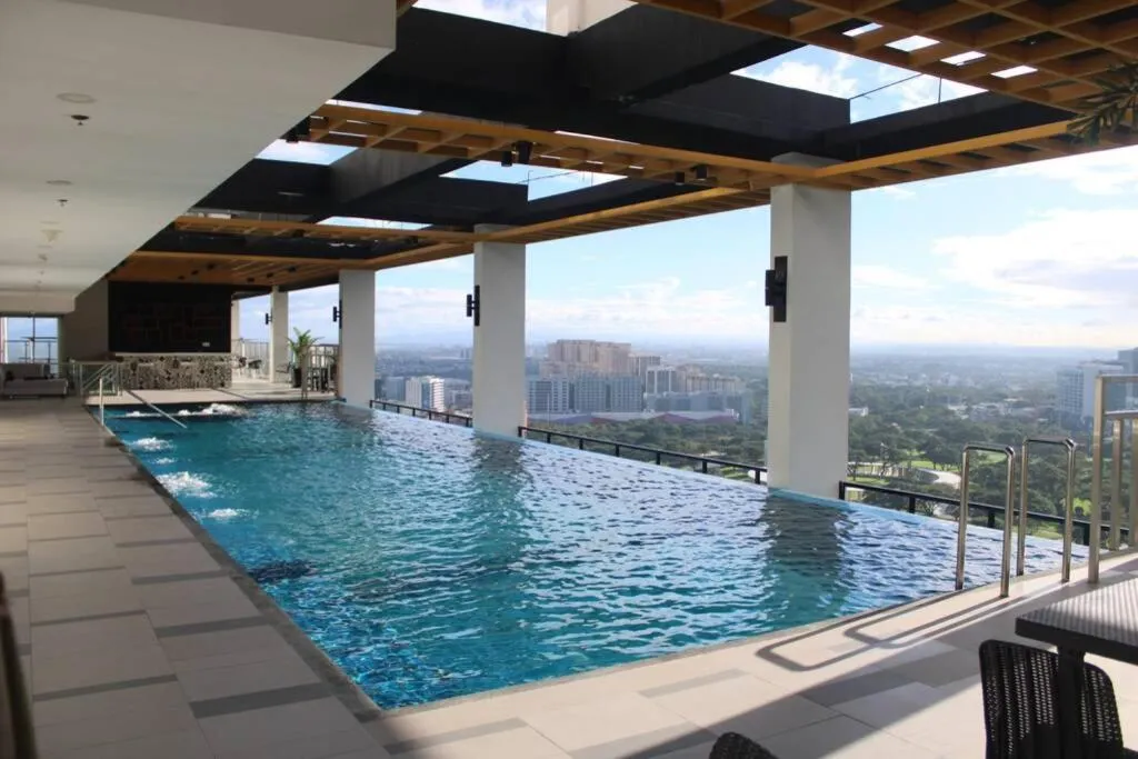 Swimming pool in A2J Luxury BGC Balcony Suite Near SM AURA Taguig