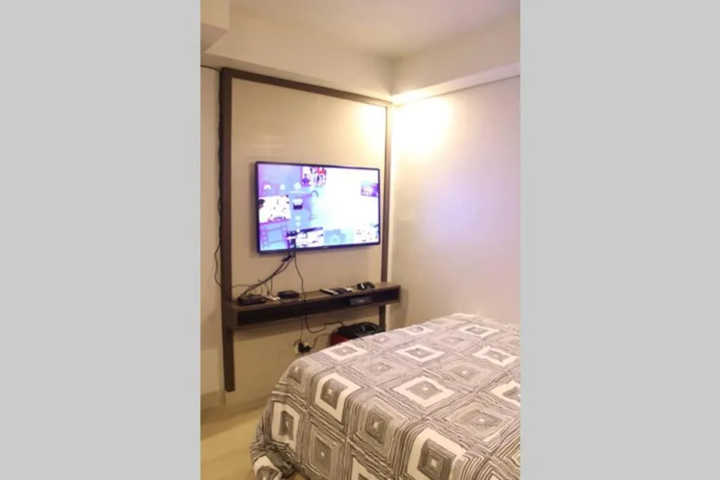 Bed in A2J Luxury BGC Balcony Suite Near SM AURA Taguig