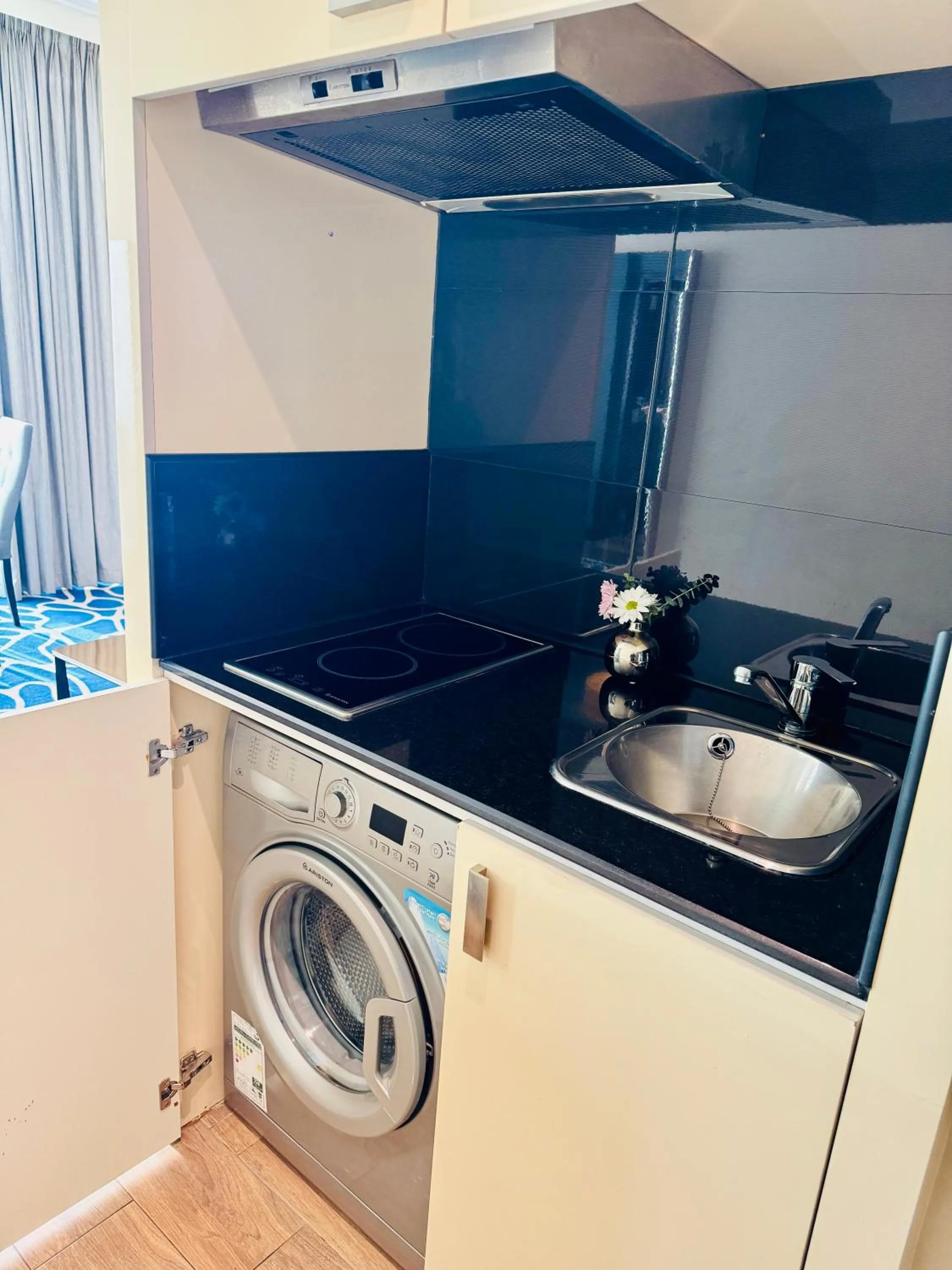 Kitchen or kitchenette in Hawthorn Suites by Wyndham Abu Dhabi City Center