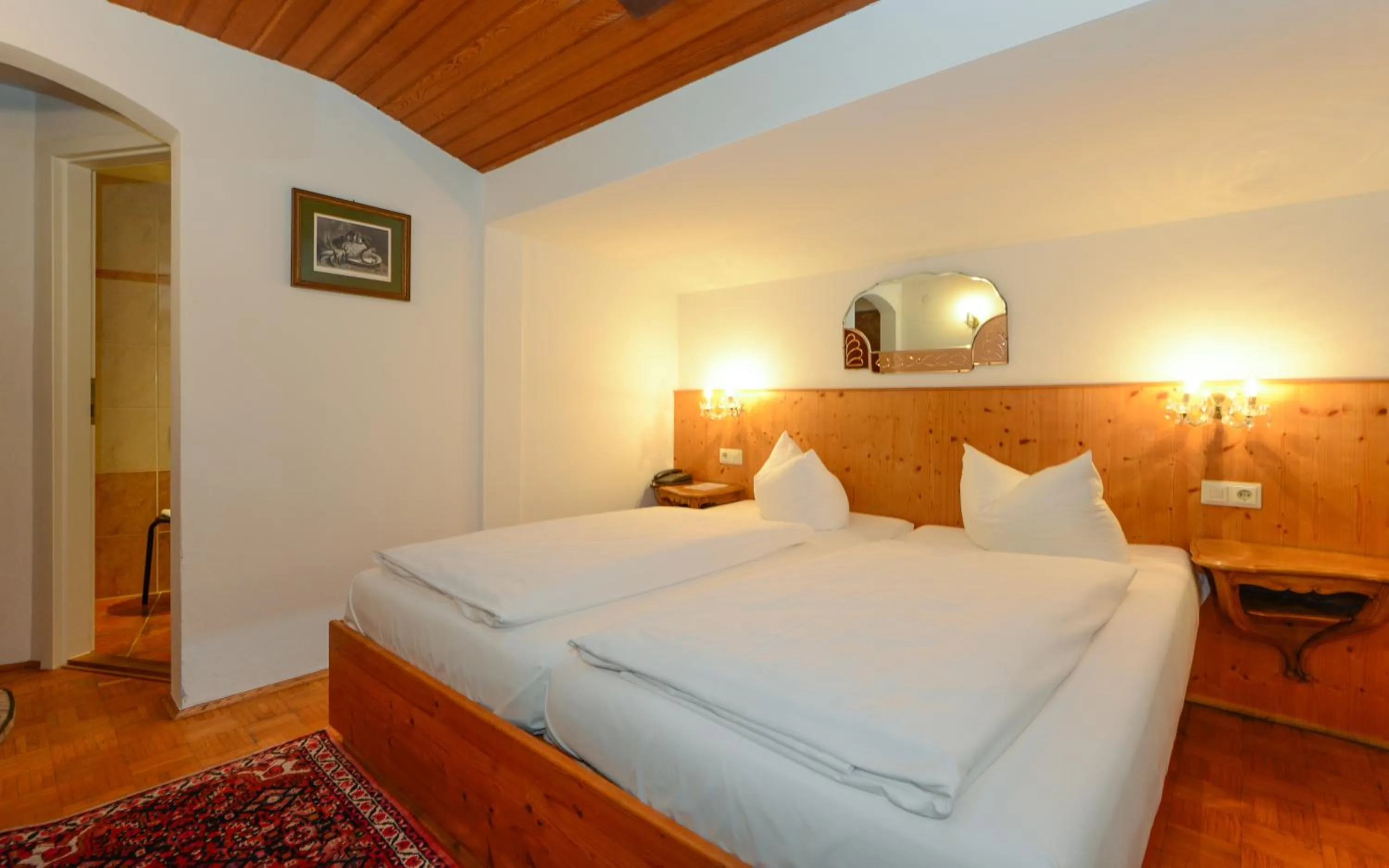 Photo of the whole room, Bed in Stoll's Hotel Alpina