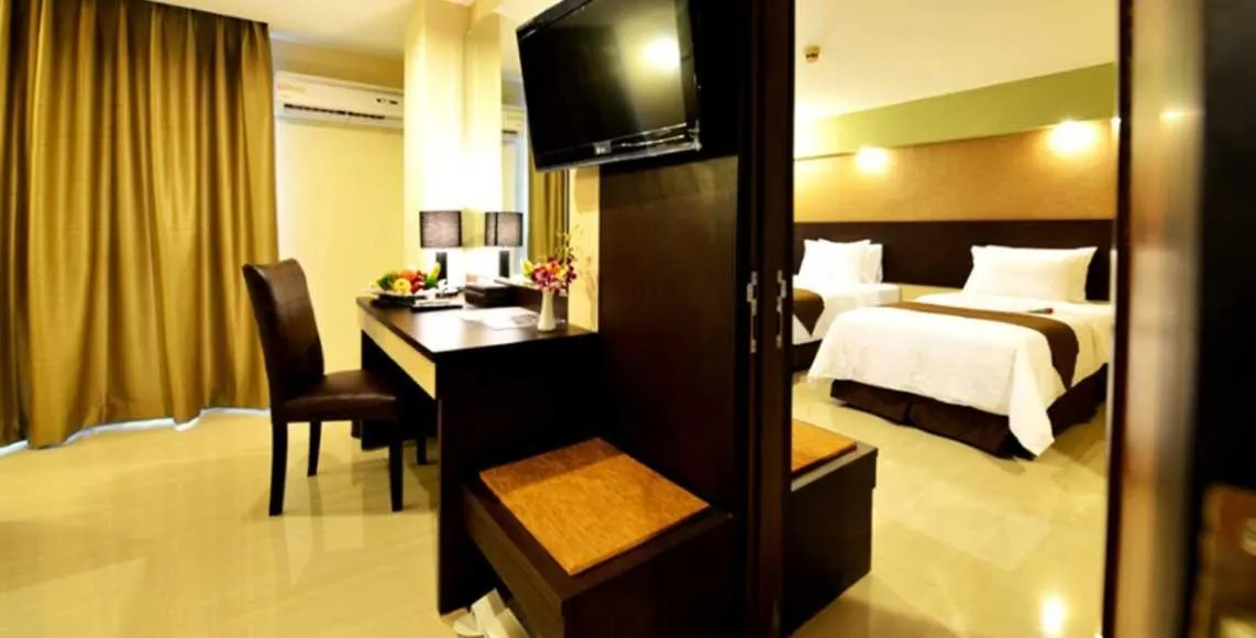 Bed in The Naripan Hotel