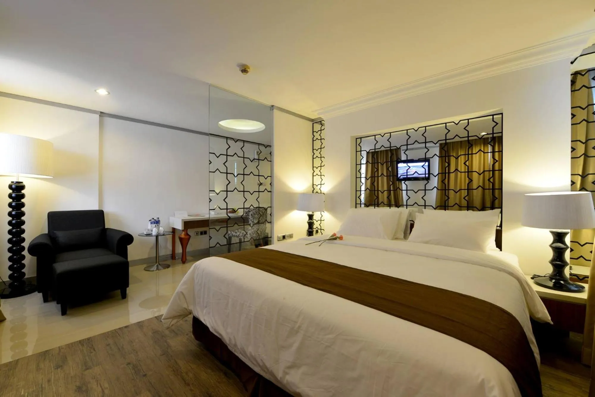 Bed in The Naripan Hotel