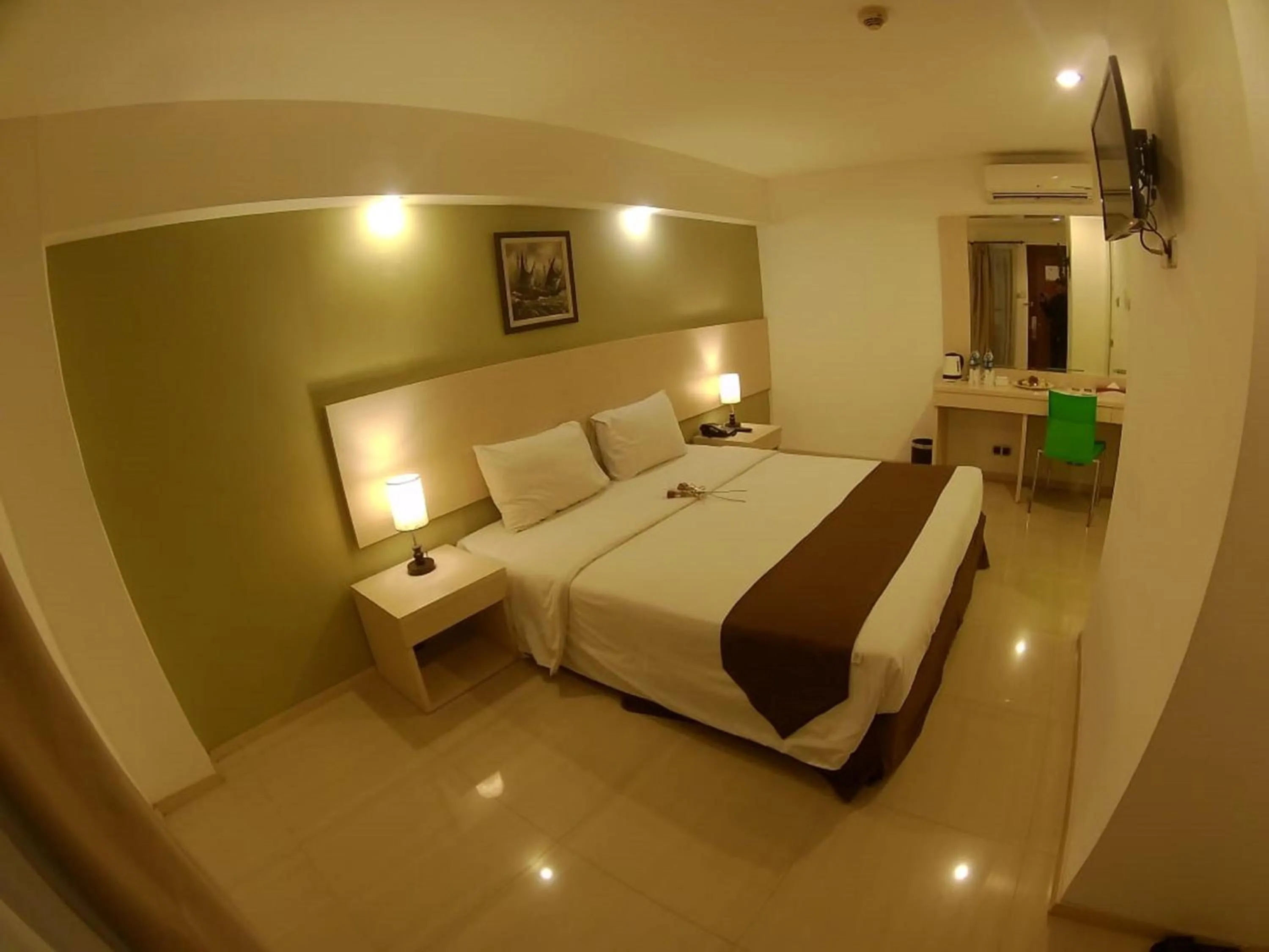 Bed in The Naripan Hotel