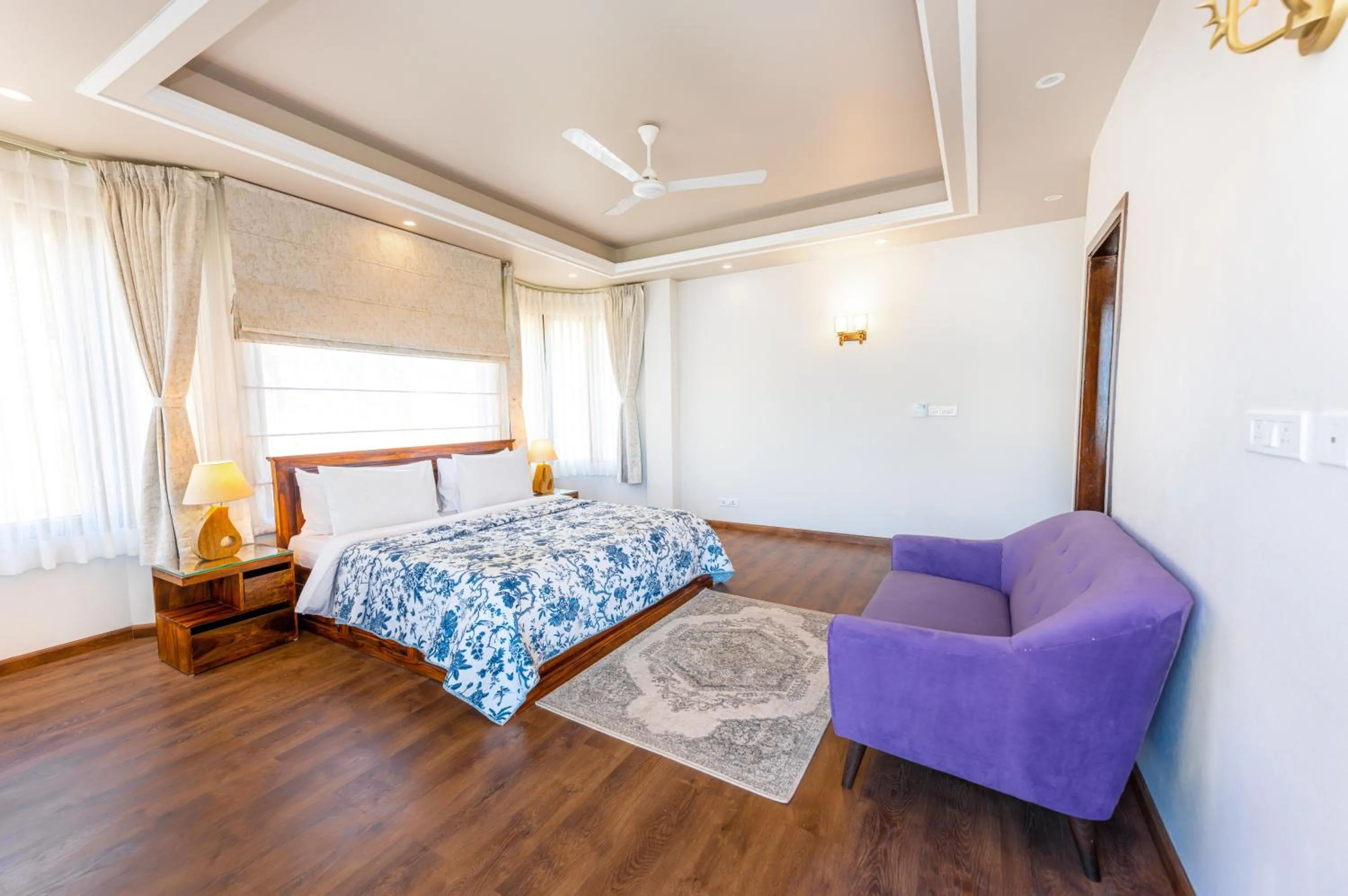 Seating area, Bed in The Manor Luxury Apartments, Shimla