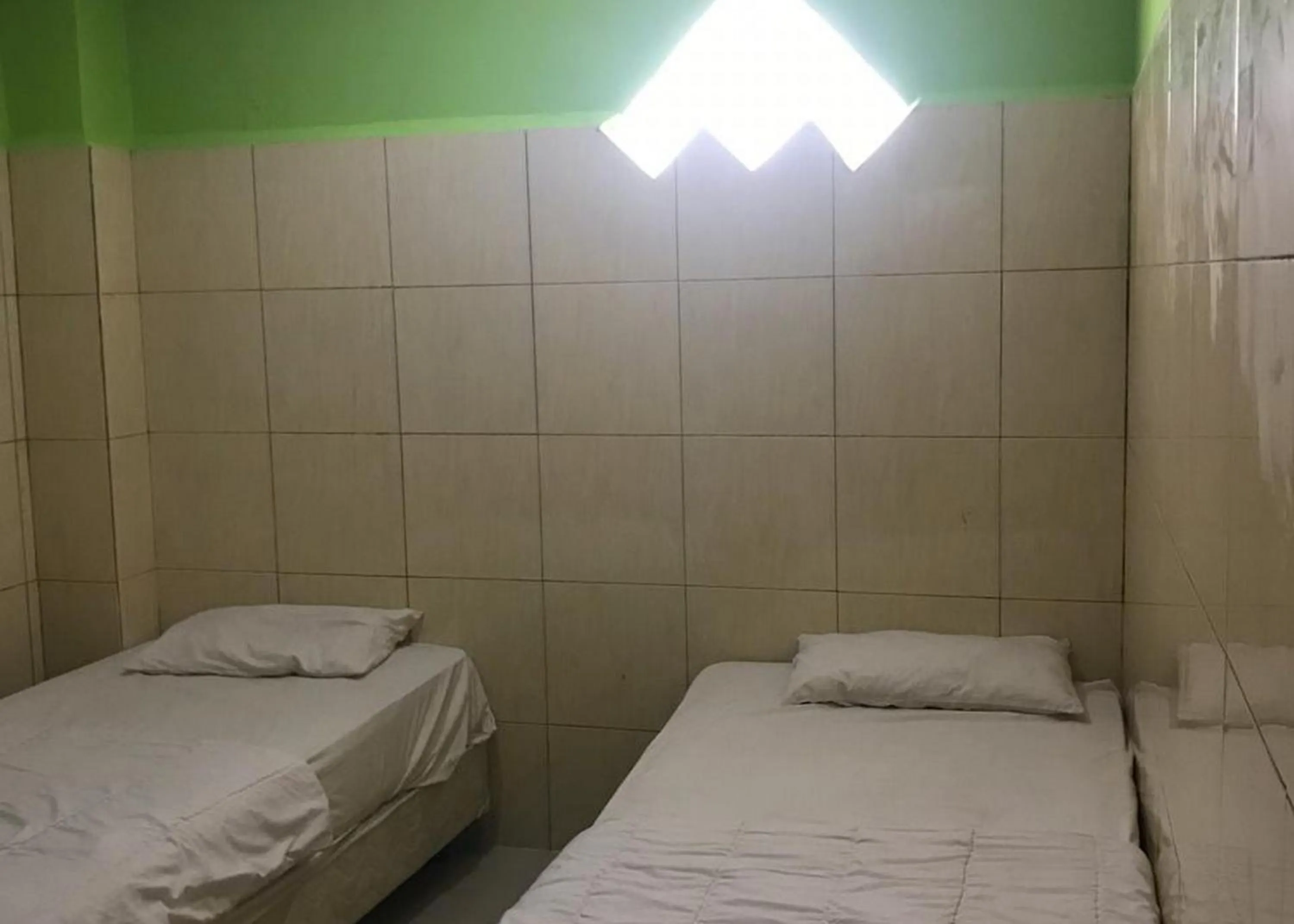 Bed in Hotel Mulia Kendari Mitra RedDoorz