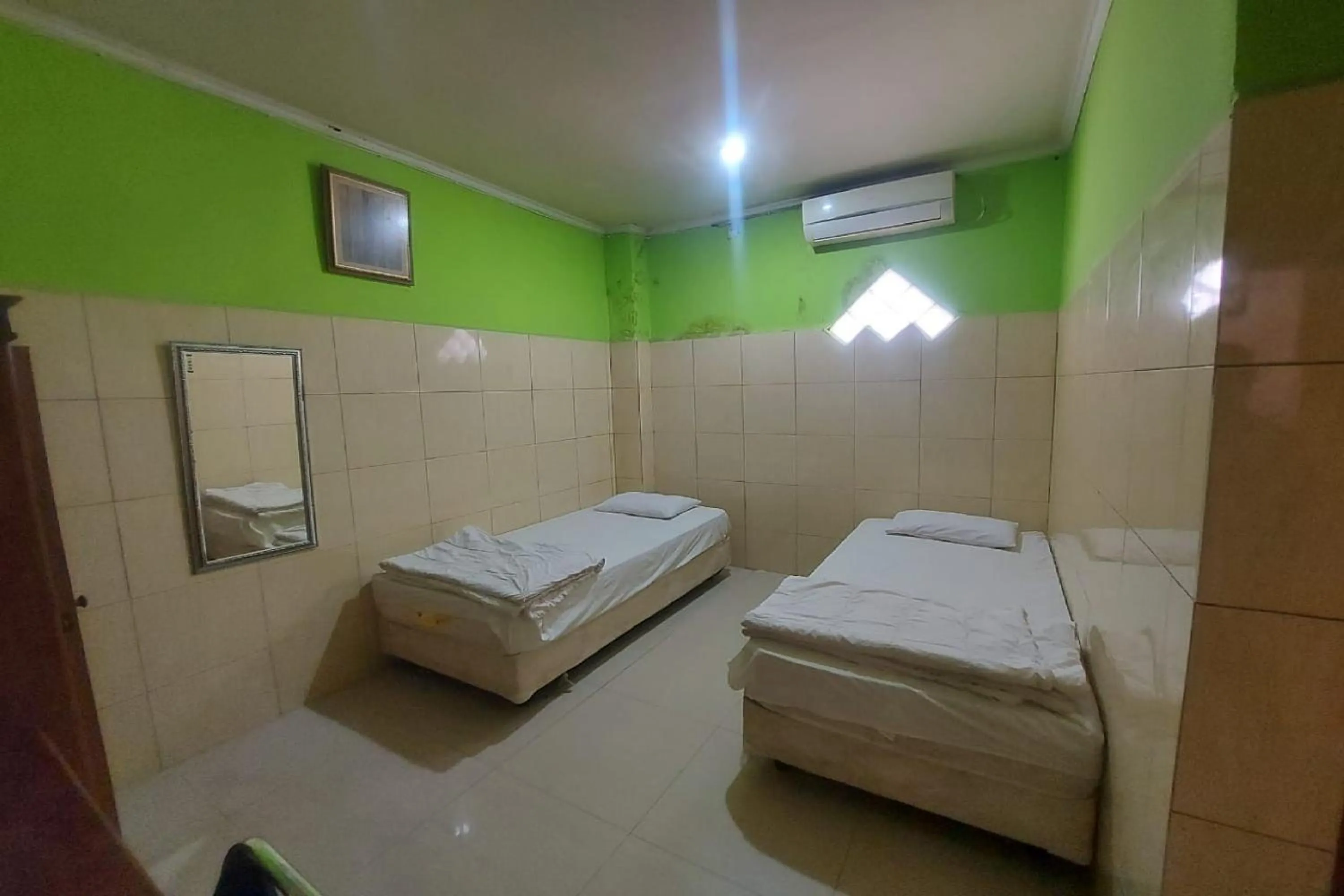 Bedroom, Bed in Hotel Mulia Kendari Mitra RedDoorz