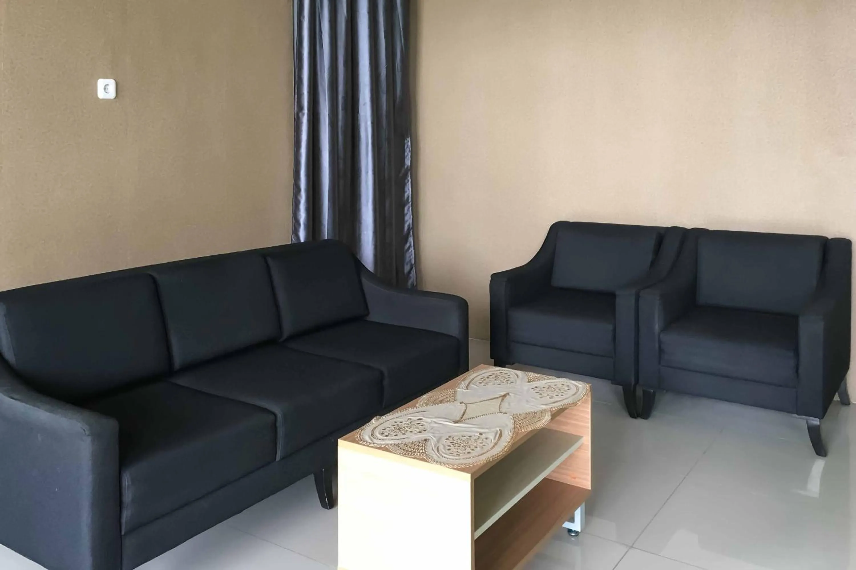 Living room in Wisma Syariah UINSU Medan Mitra RedDoorz