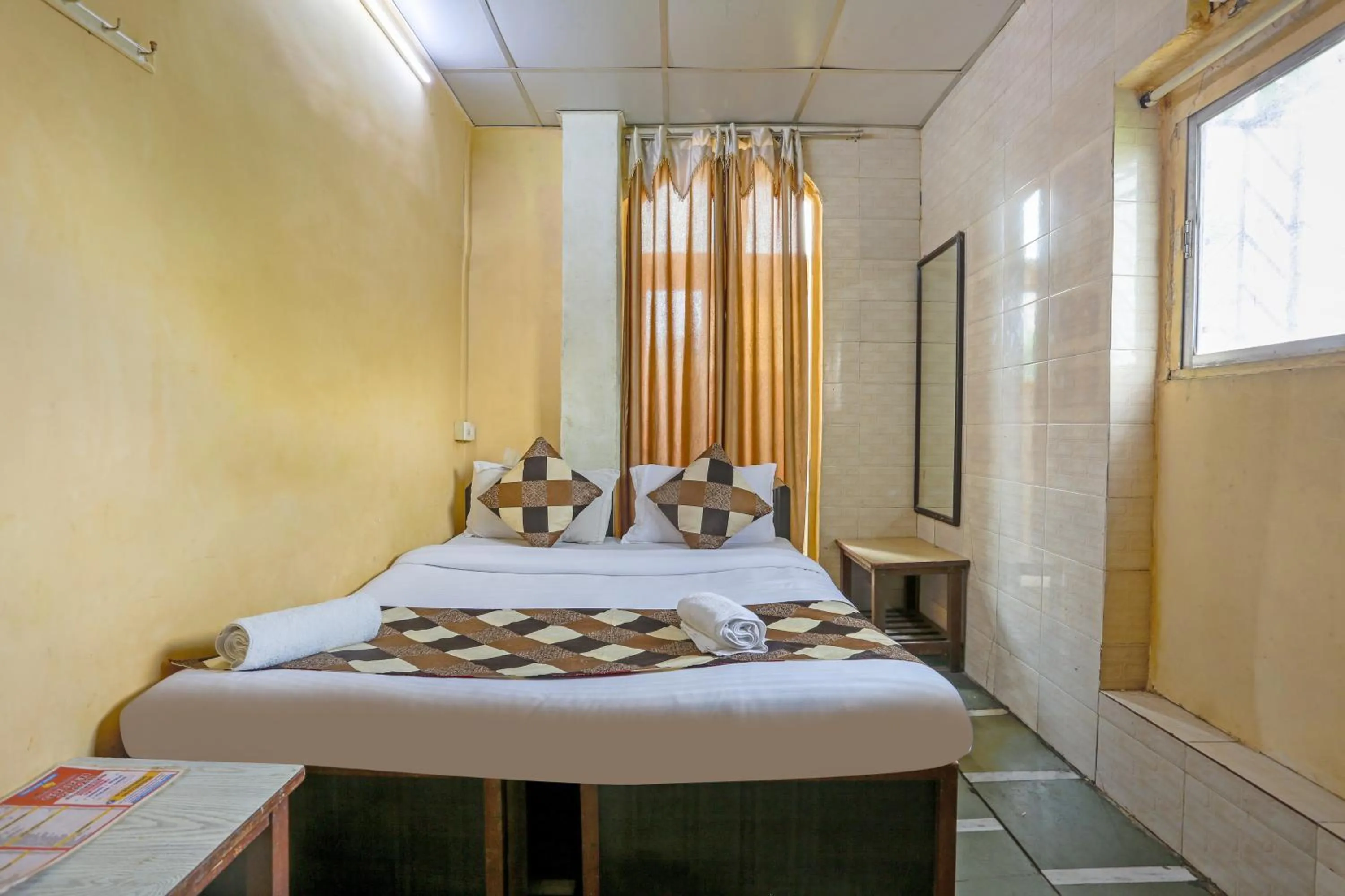 Photo of the whole room, Bed in HOTEL GOLDEN PLAZA