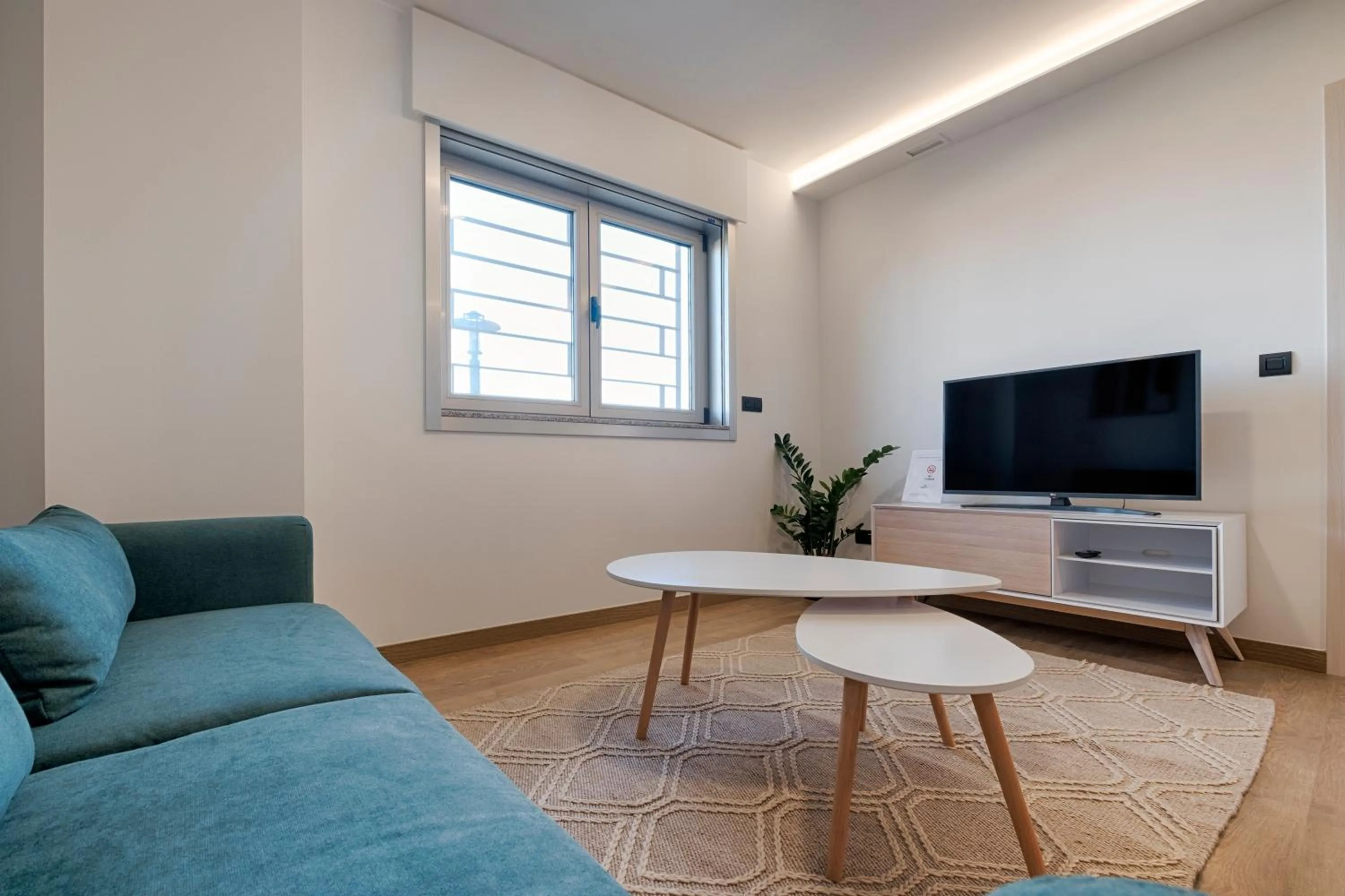 TV and multimedia in TH Apartments by Como en Casa