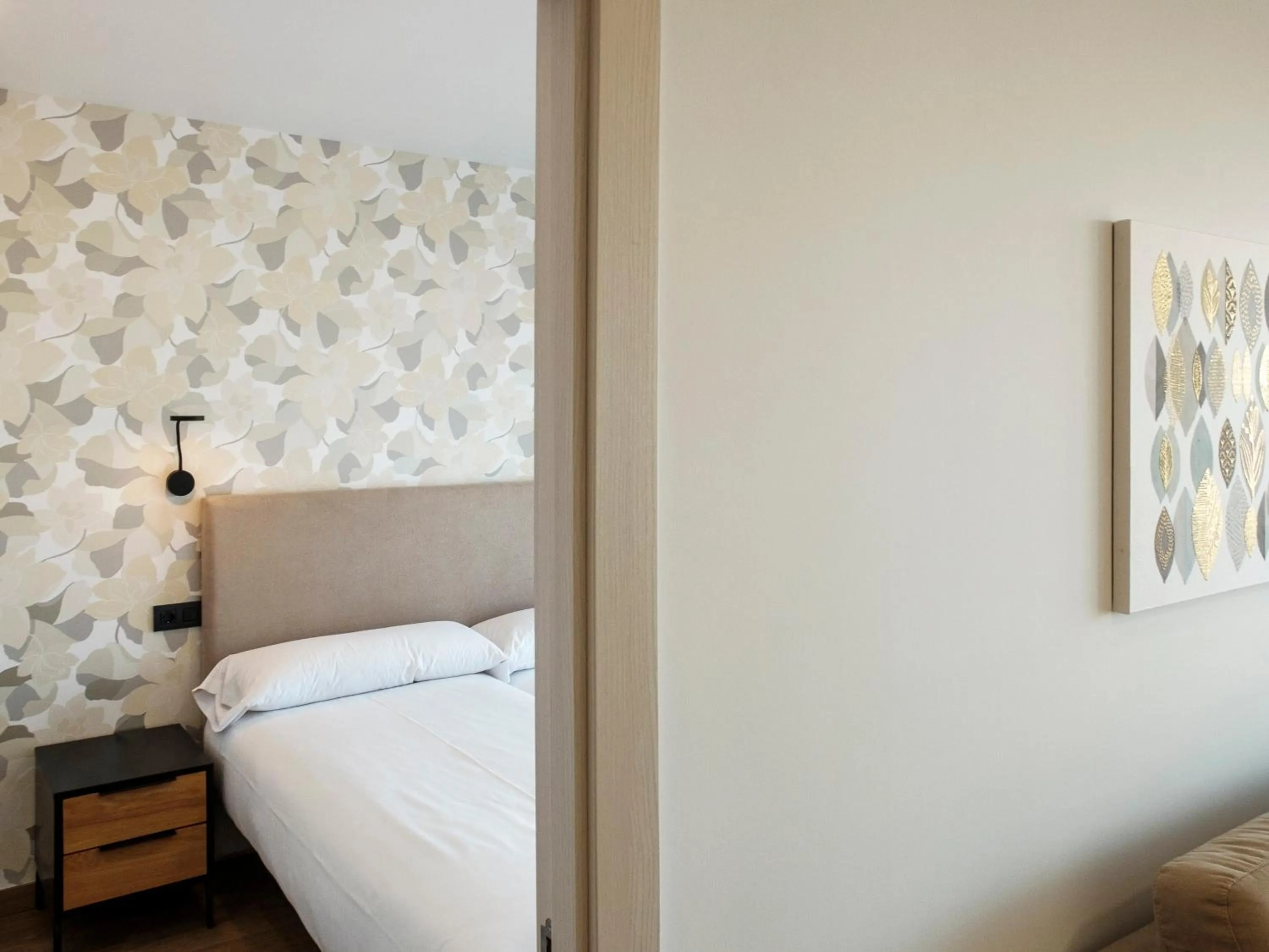 Bed in TH Apartments by Como en Casa