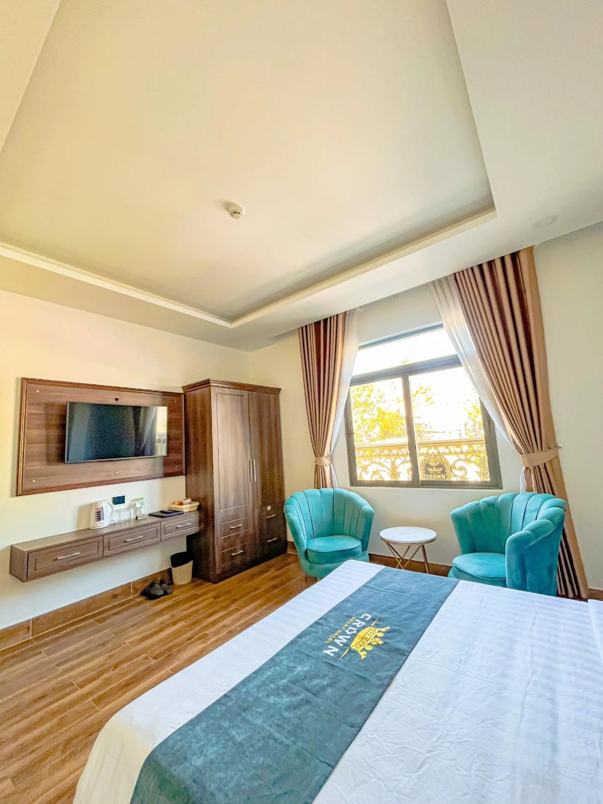 Bed in Crown Dalat Hotel