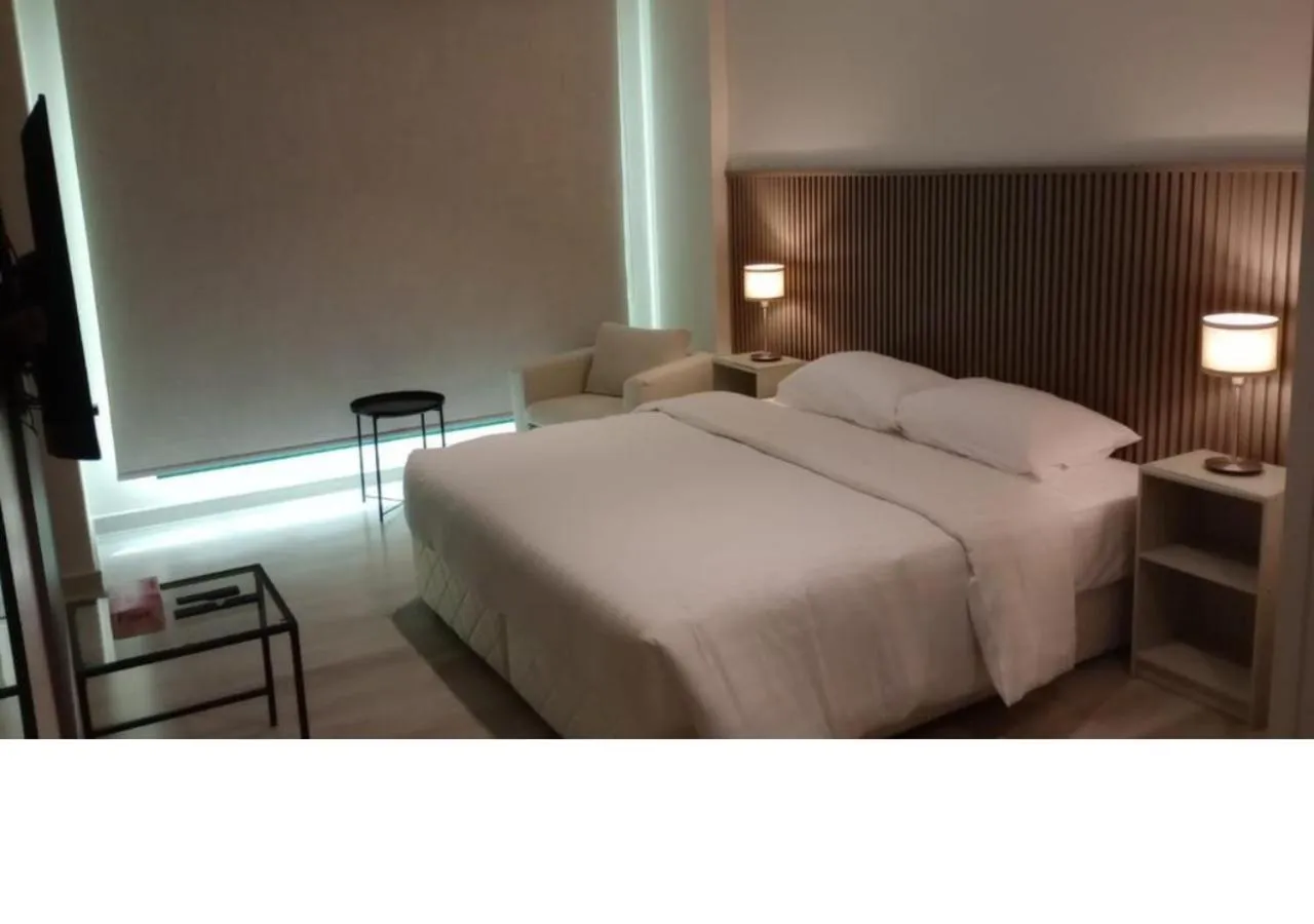 Bed in Times Square Suite Hotel