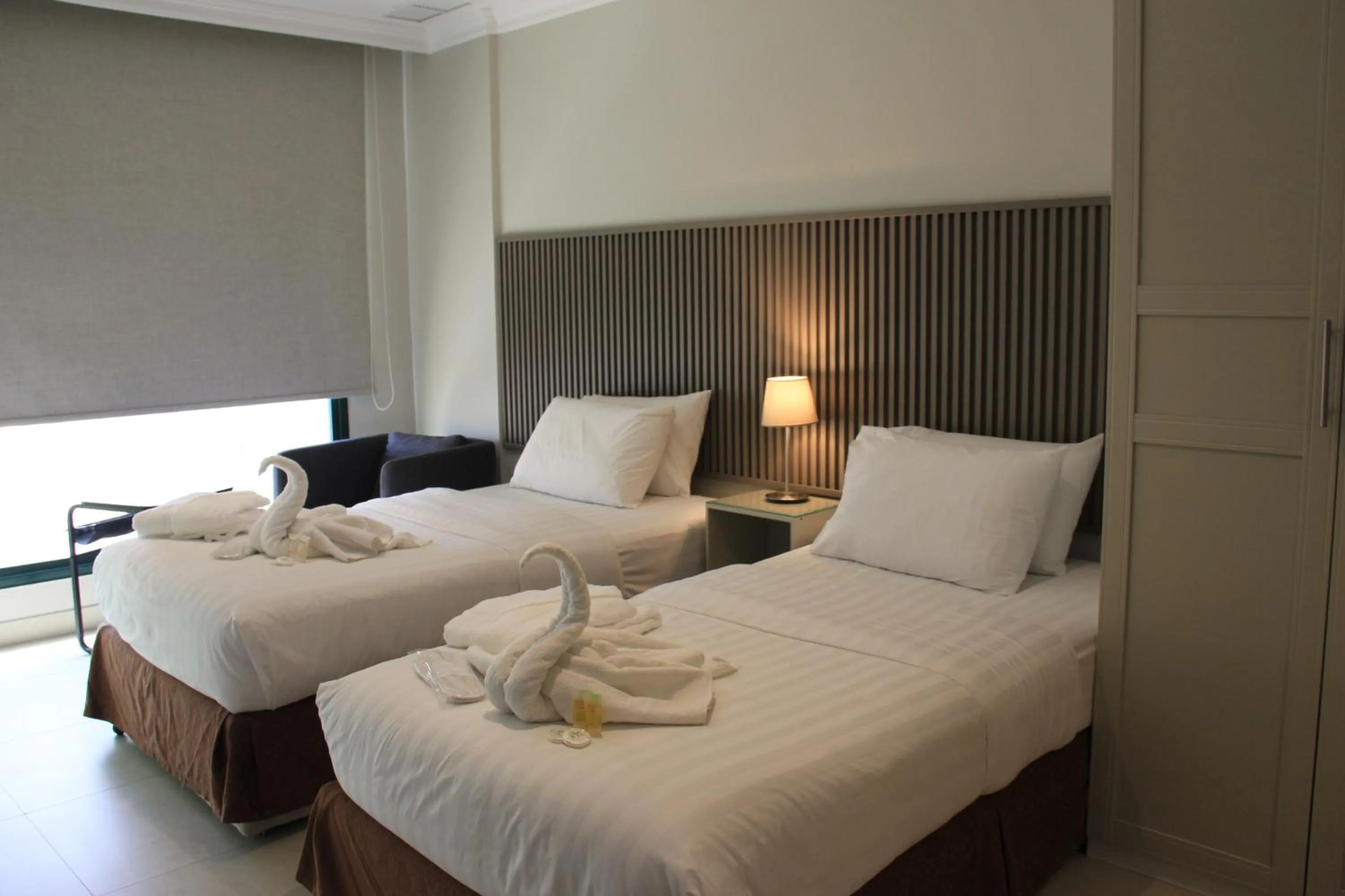 Bed in Times Square Suite Hotel