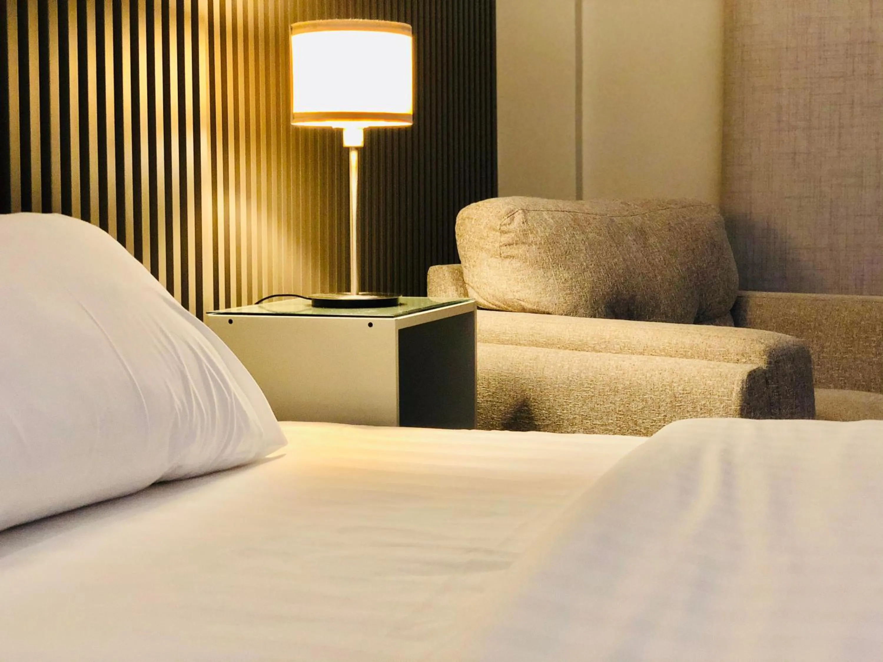 Bed in Times Square Suite Hotel