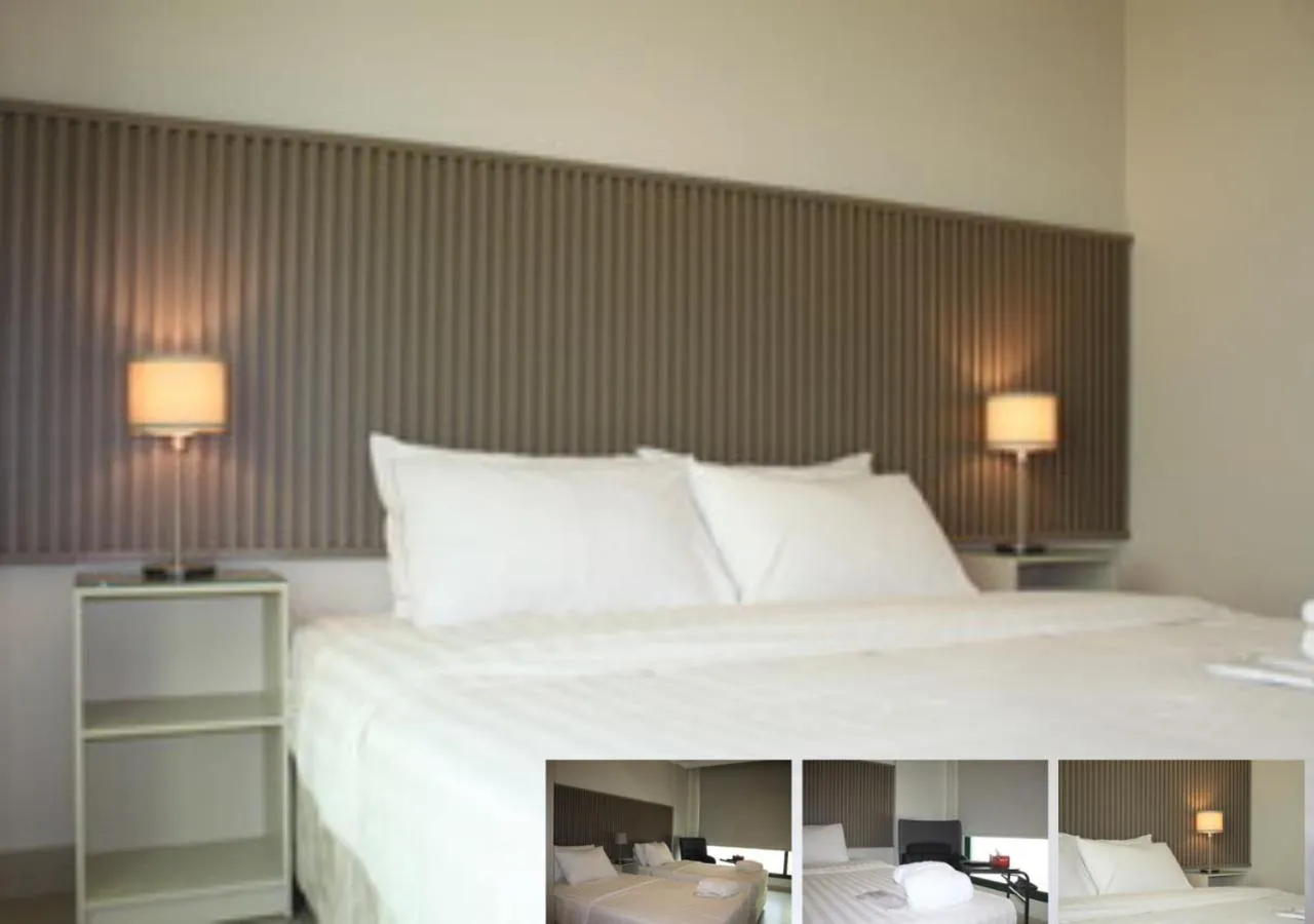 Bed in Times Square Suite Hotel