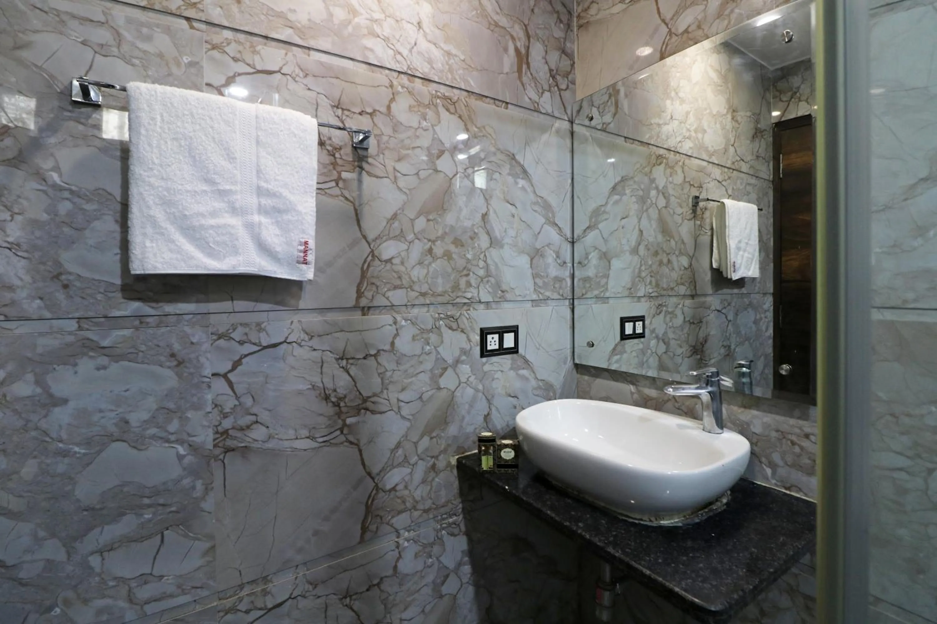 Bathroom in Hotel Mannat international by Mannat