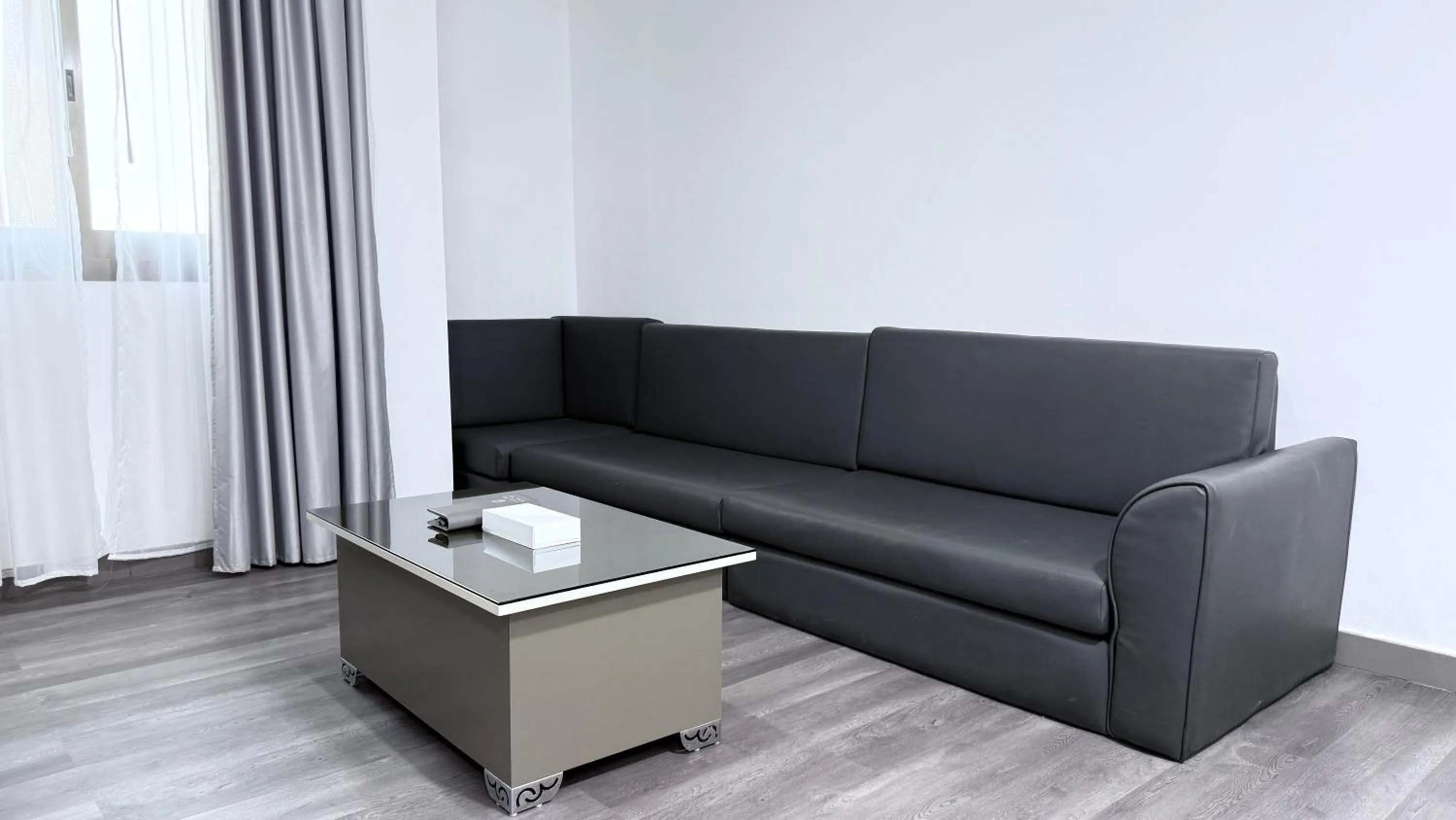 Seating area in Palette Sharjah Aparthotel formerly Royal Tulip