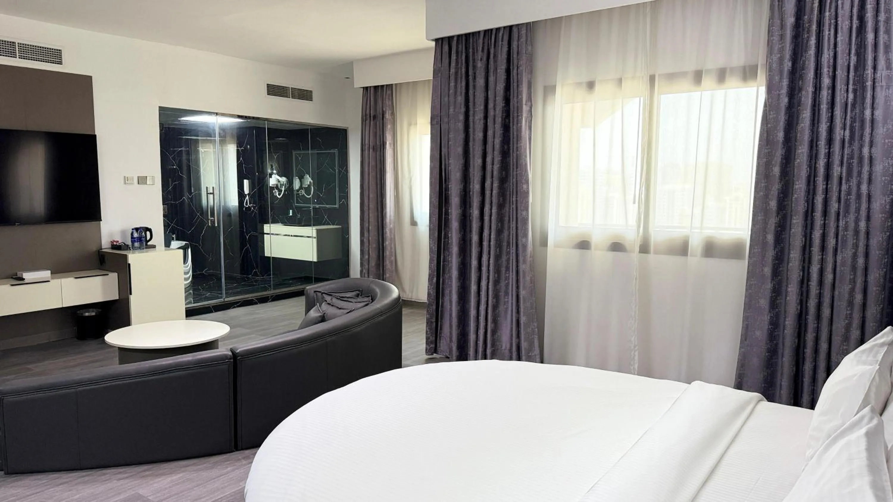 Photo of the whole room, Bed in Palette Sharjah Aparthotel formerly Royal Tulip