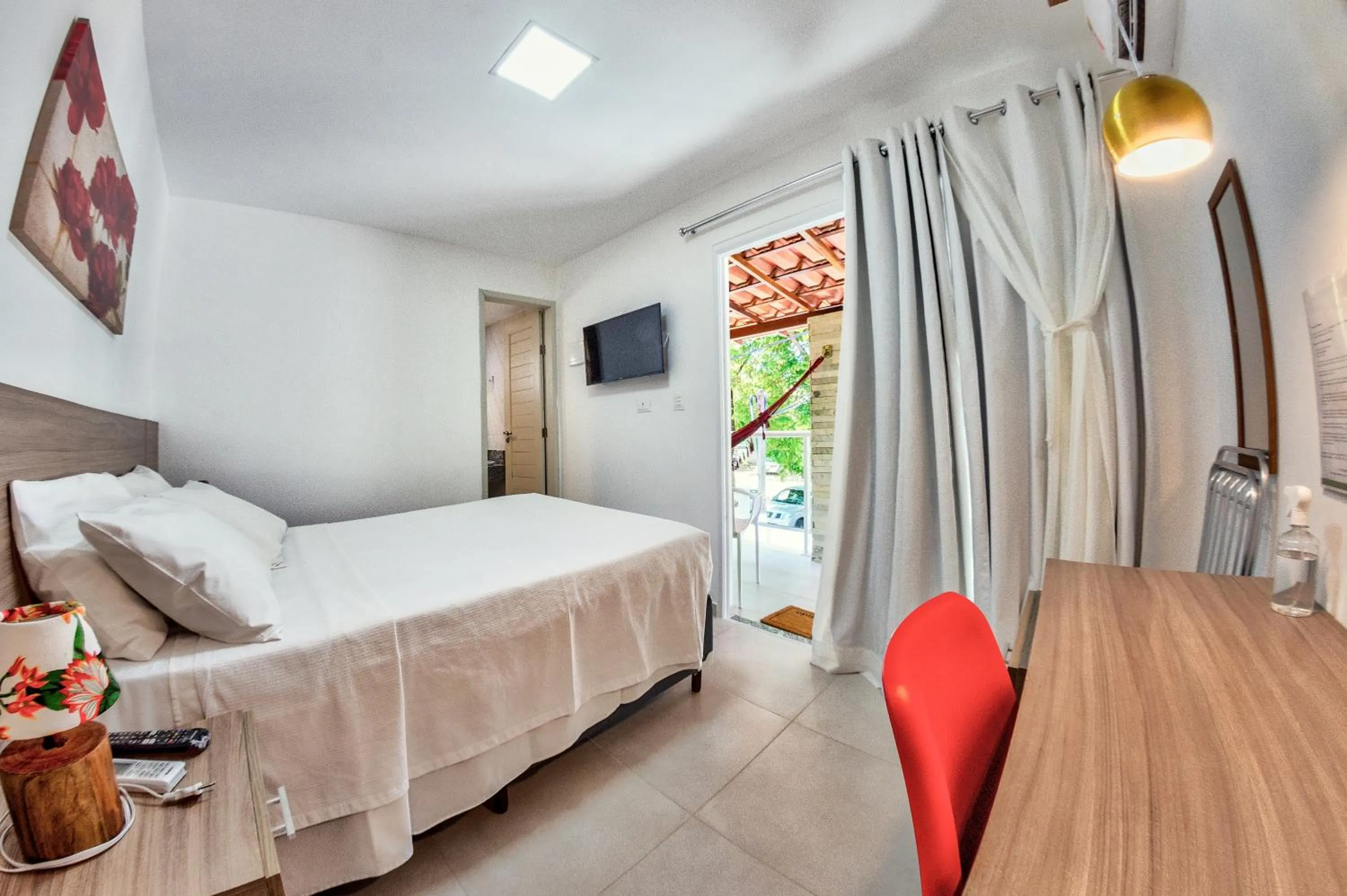 Photo of the whole room, Bed in Flats Angatu Porto de Galinhas PE