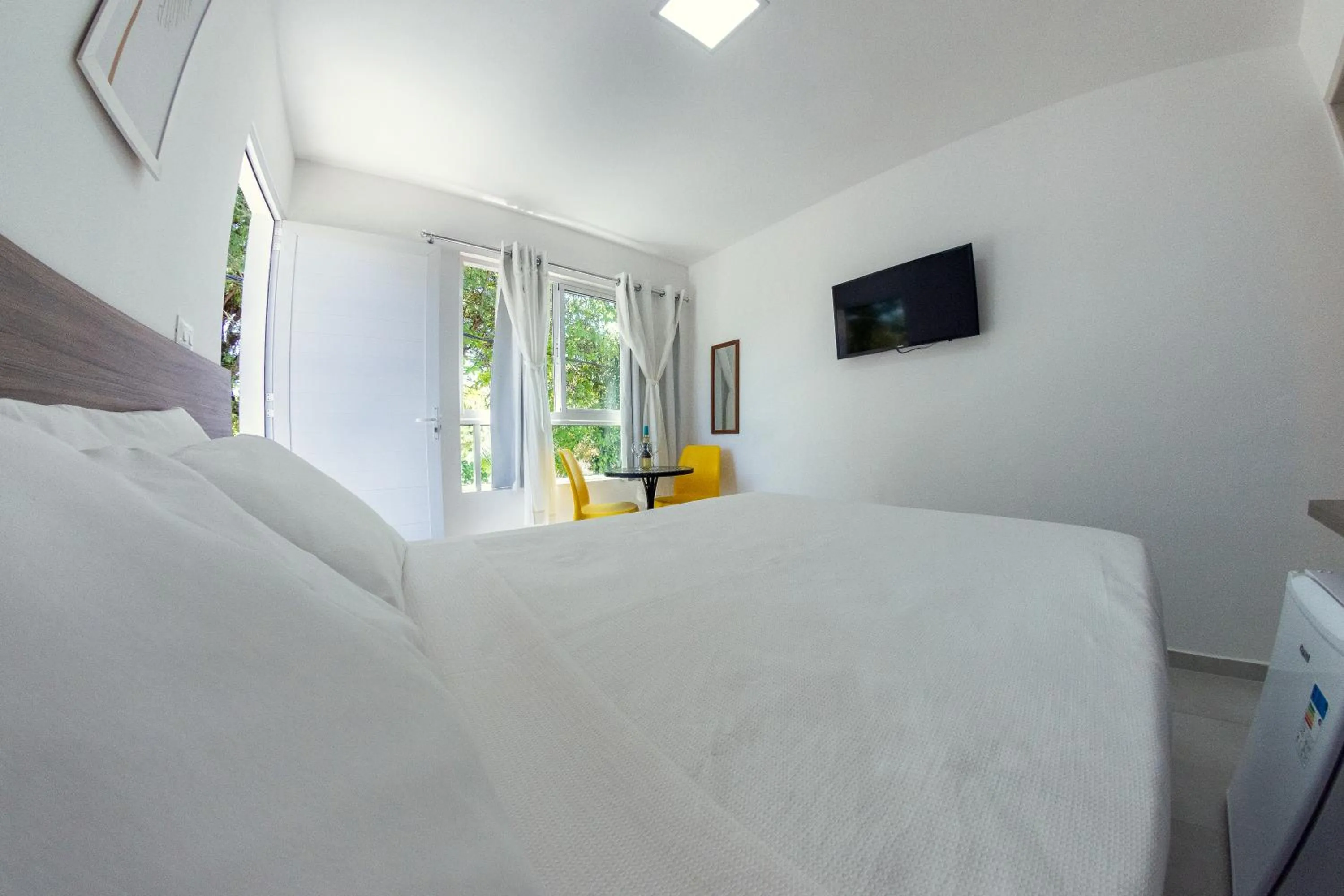 Photo of the whole room, Bed in Flats Angatu Porto de Galinhas PE