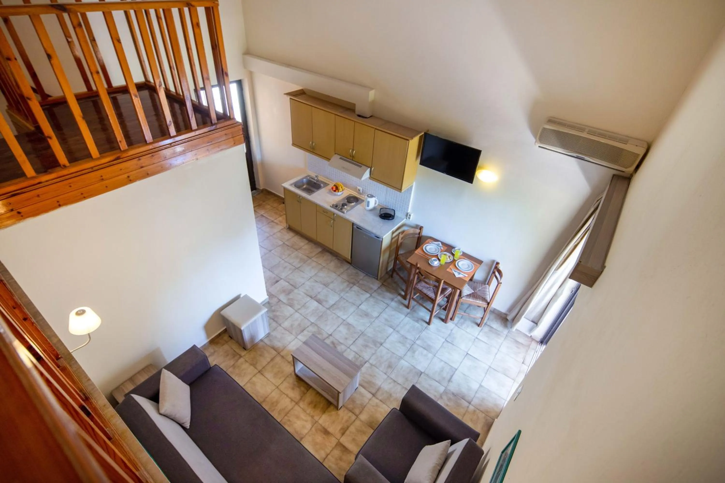 Communal lounge/ TV room in Hotel Rossis