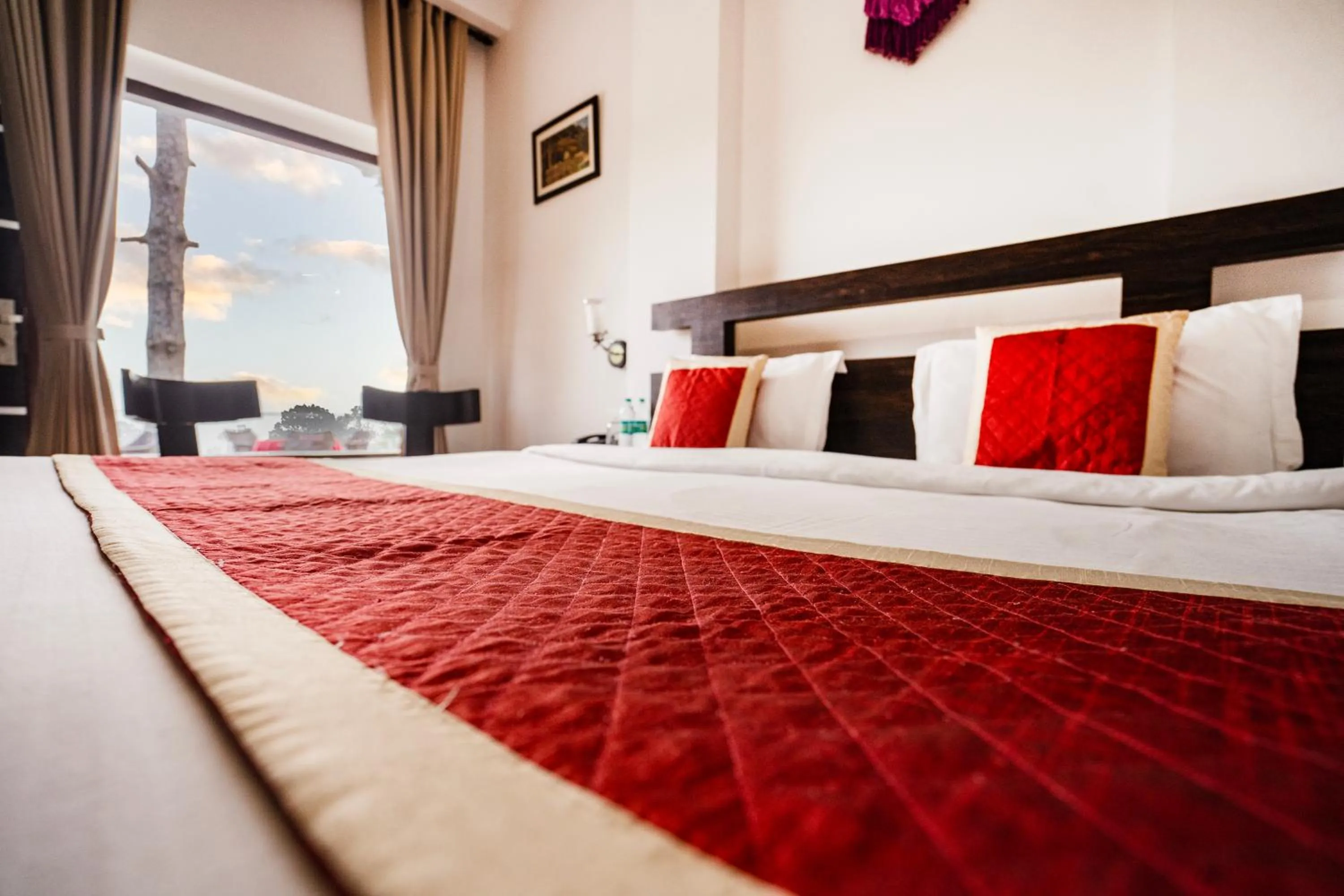 Bed in The Golden Sunrise Hotel