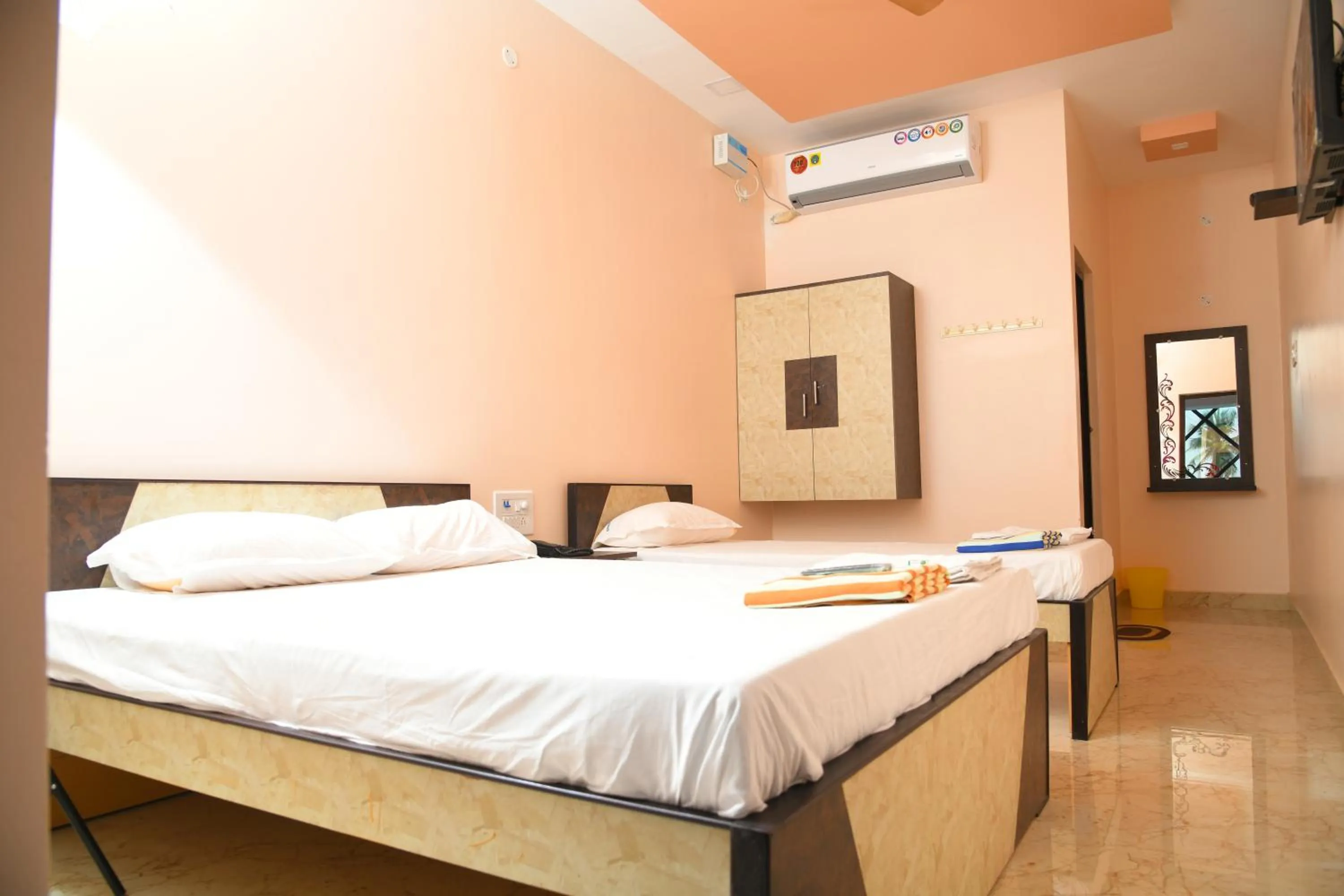 Photo of the whole room, Bed in Sivamurugan residency