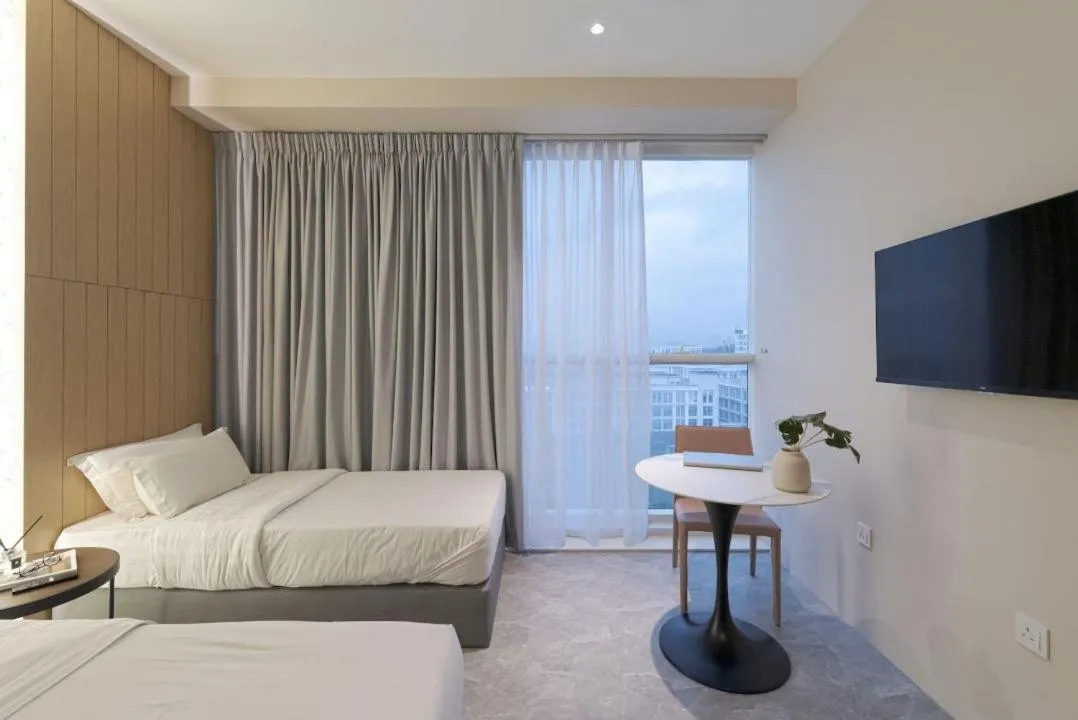 Photo of the whole room, Bed in Harper Boutique Hotel at Sutera Avenue