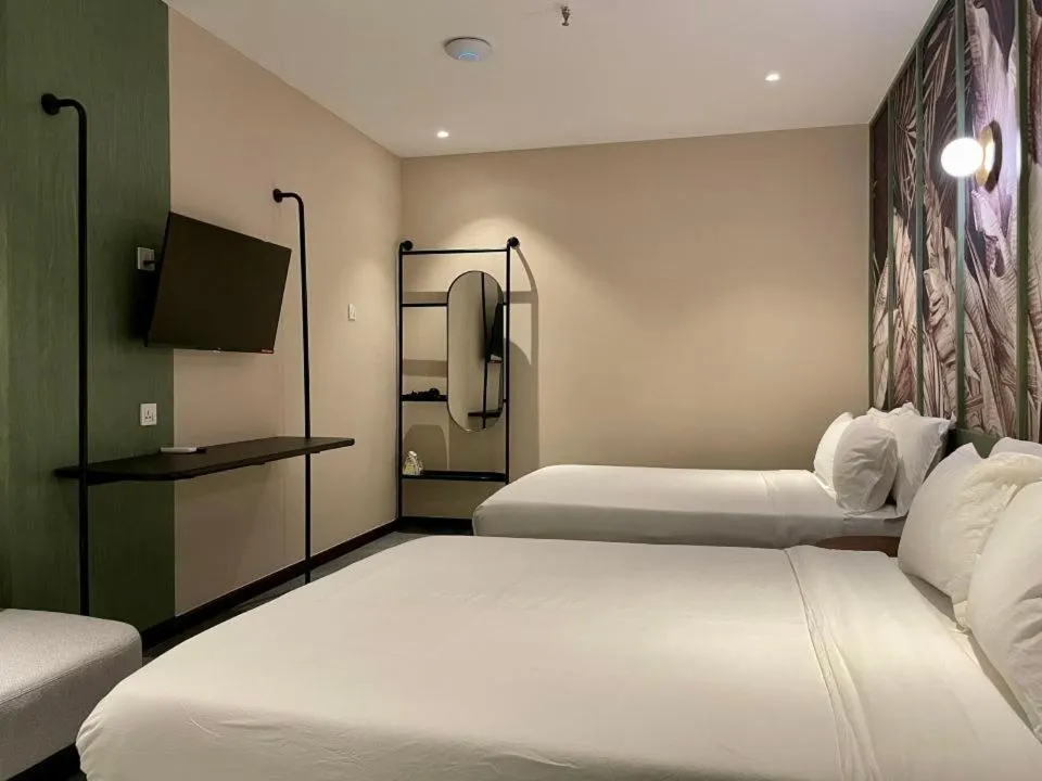 Bed in Harper Boutique Hotel at Sutera Avenue