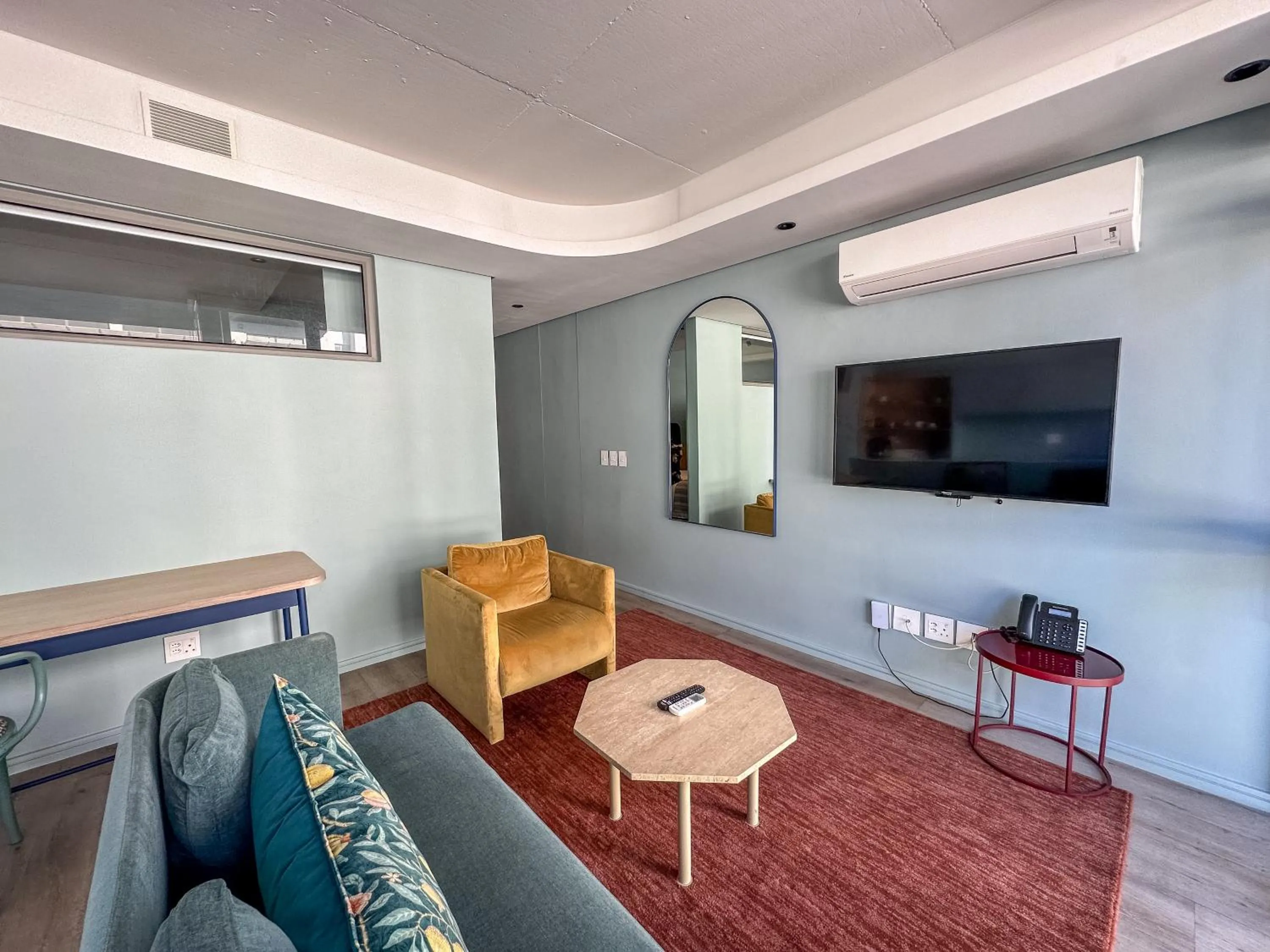 Seating area in Home Suite Hotels De Waterkant