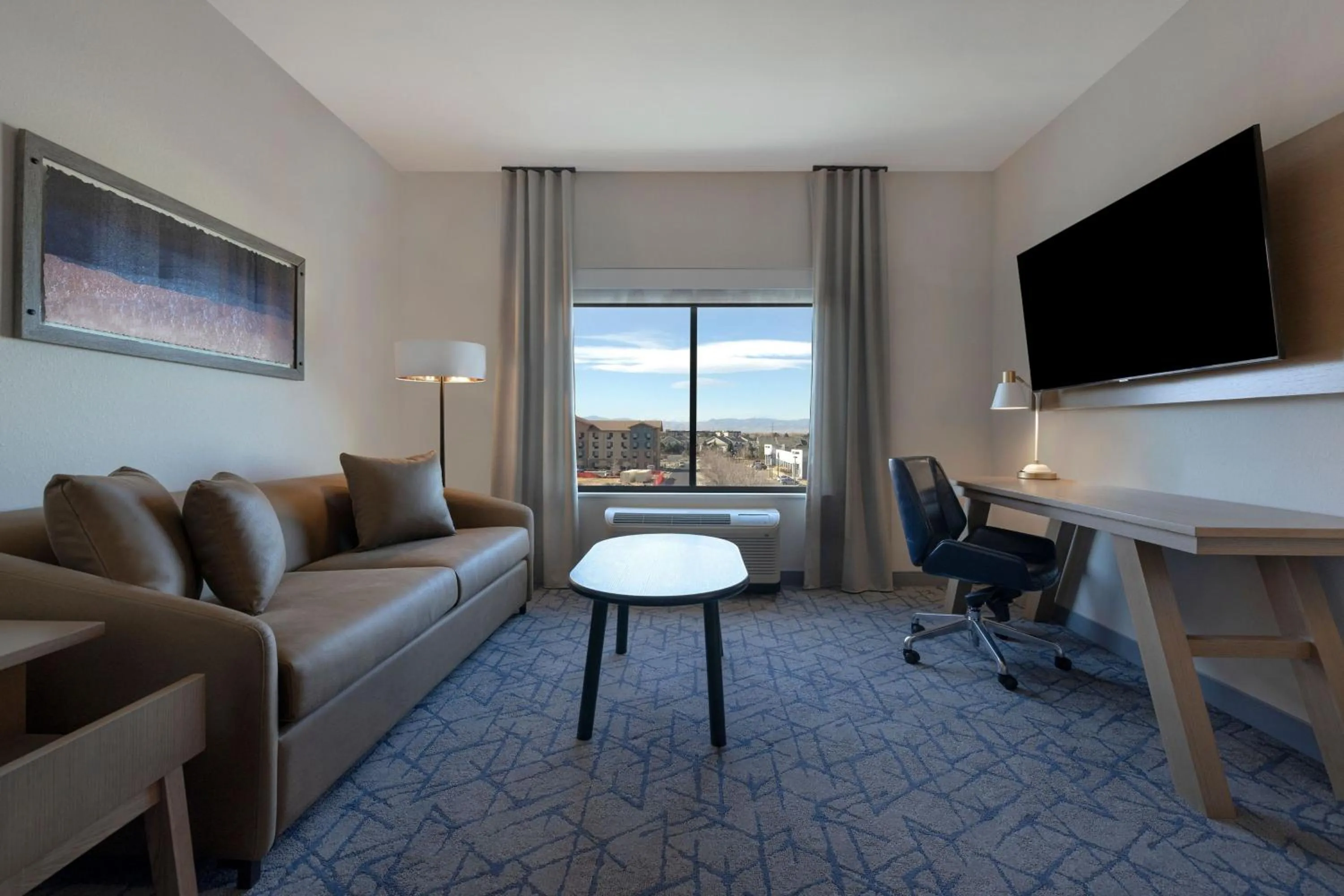 Living room in Fairfield by Marriott Inn & Suites Denver Airport at Gateway Park