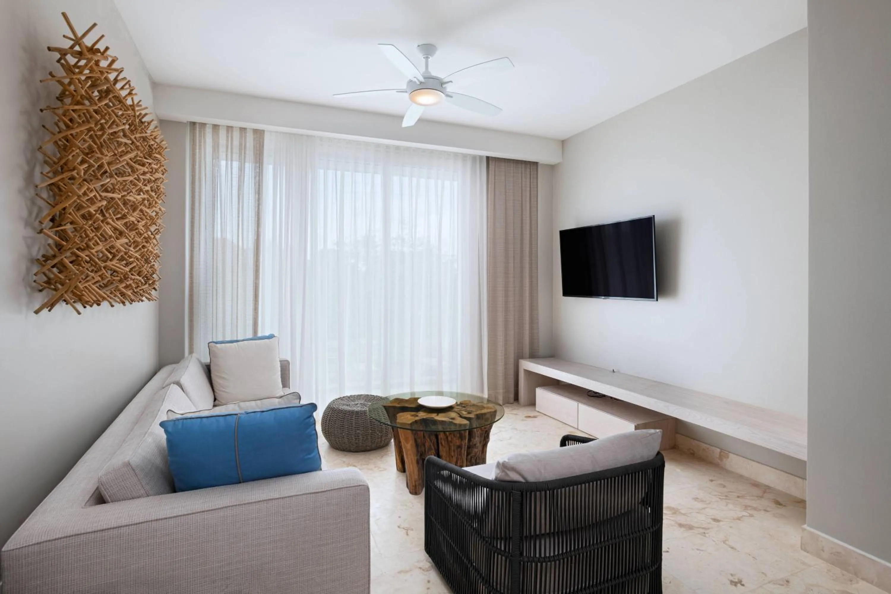 Living room in Alaia Belize, Autograph Collection