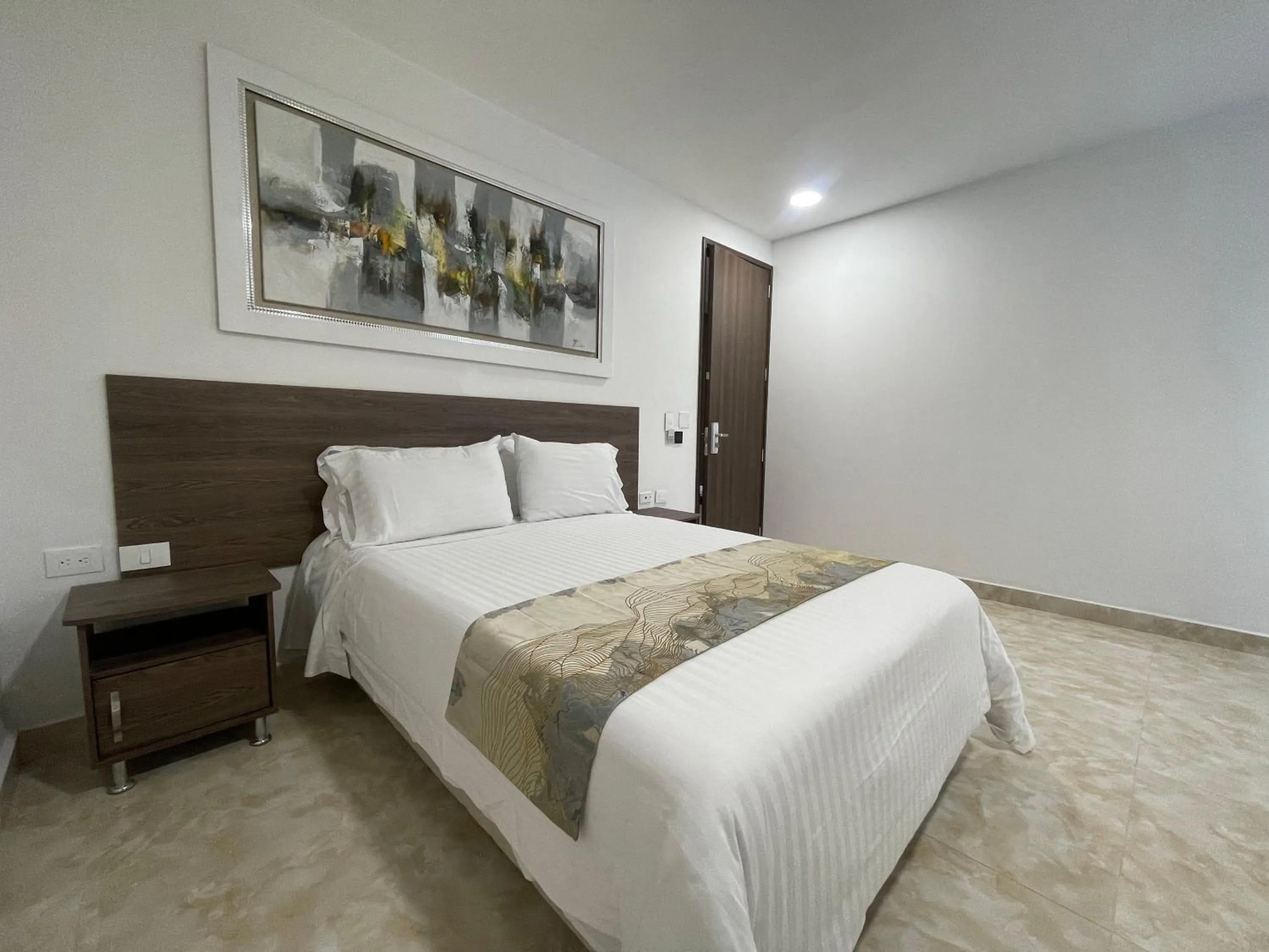 Bed in Hotel Real Elim International