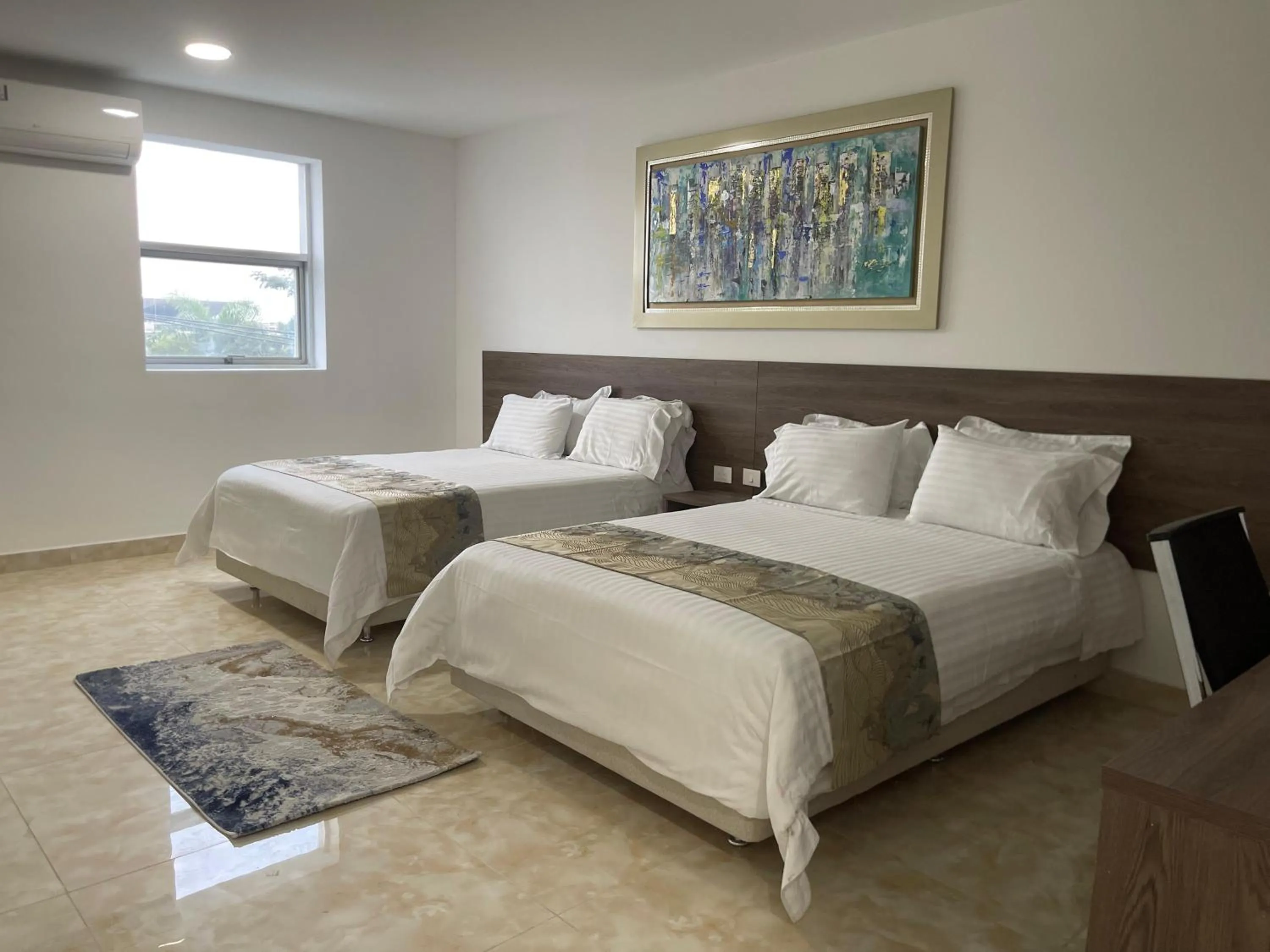 Bed in Hotel Real Elim International