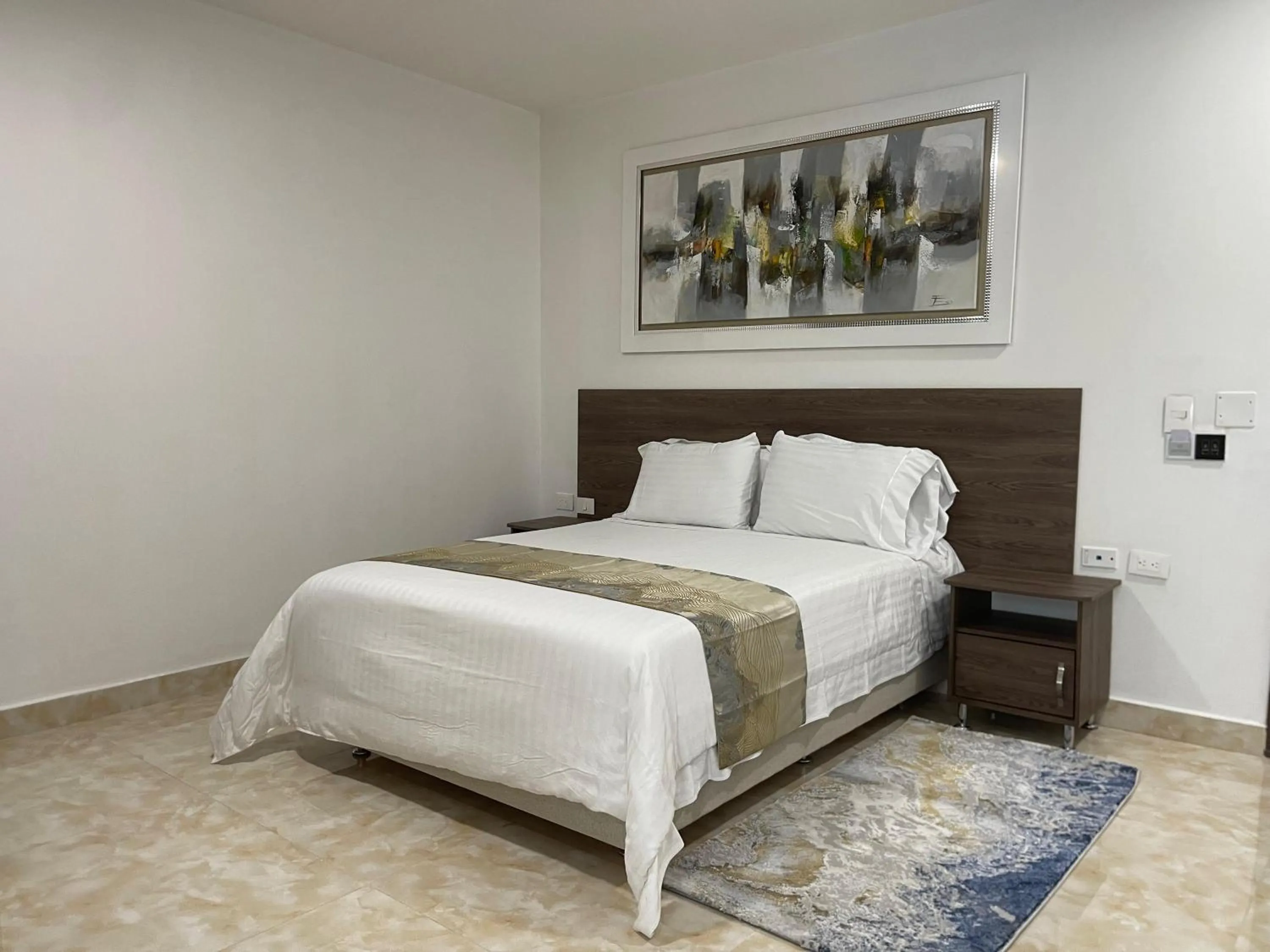 Bed in Hotel Real Elim International